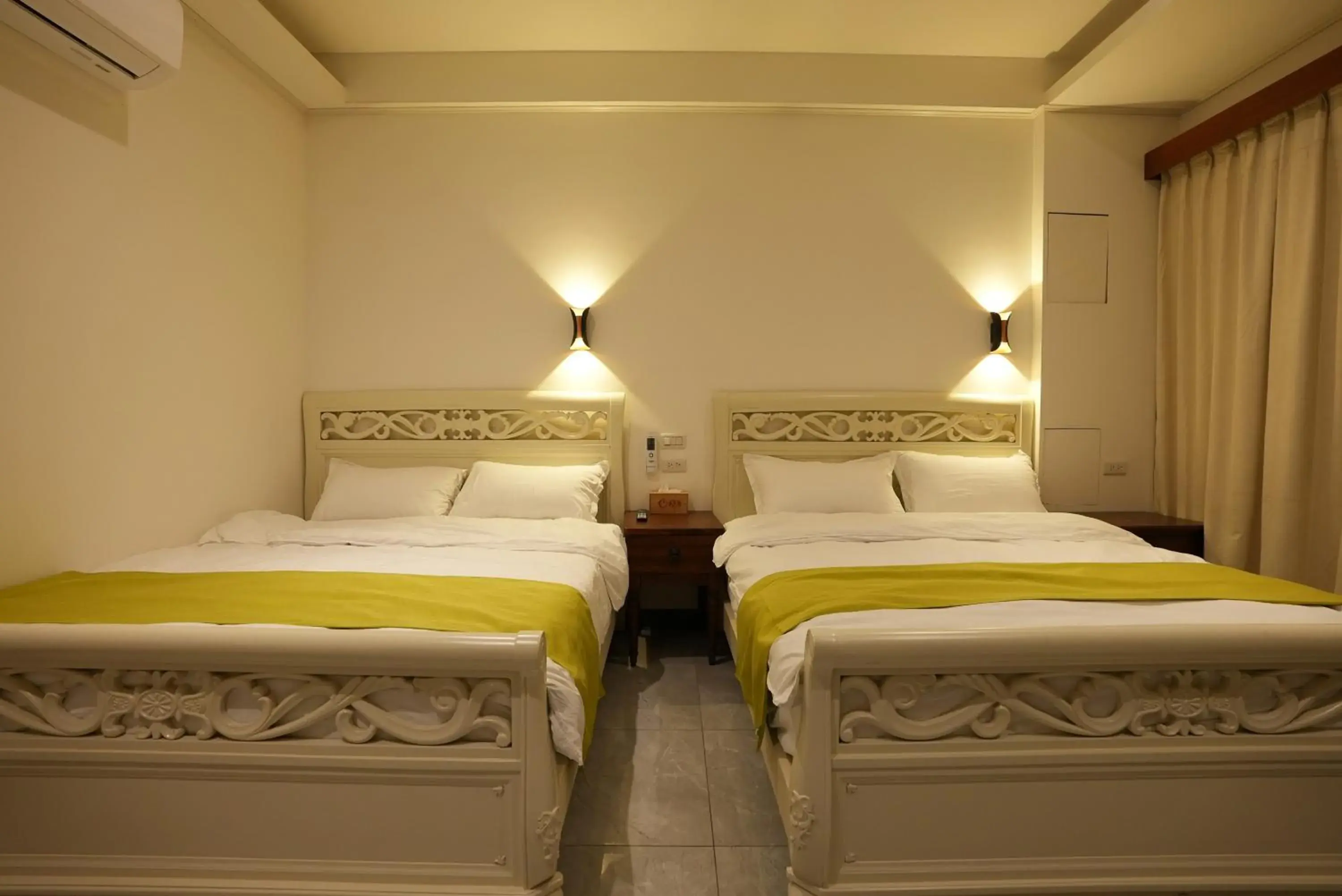 Quadruple Room with Private Bathroom in Lemuju B&B Hotel Quadruple Room with Private Bathroom in Lemuju B&B Hotel