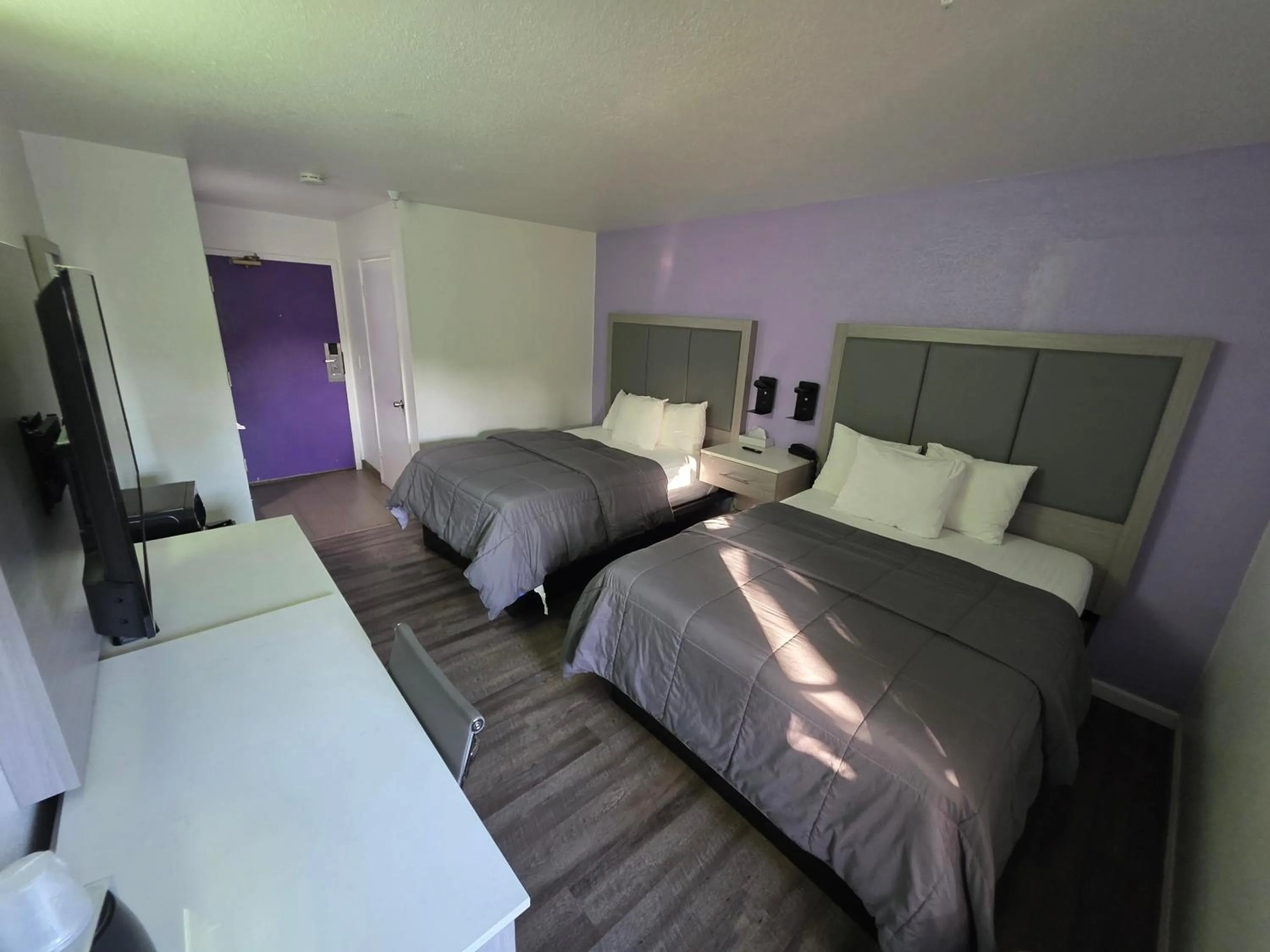 Photo of the whole room, Bed in The Aqua Pacific Hotel