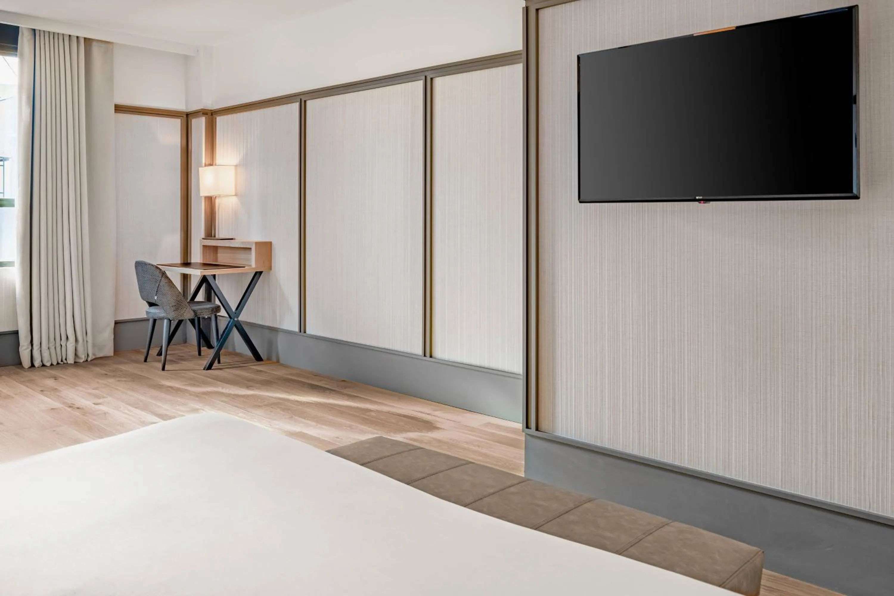 Photo of the whole room, Bed in AC Hotel Avenida de América by Marriott