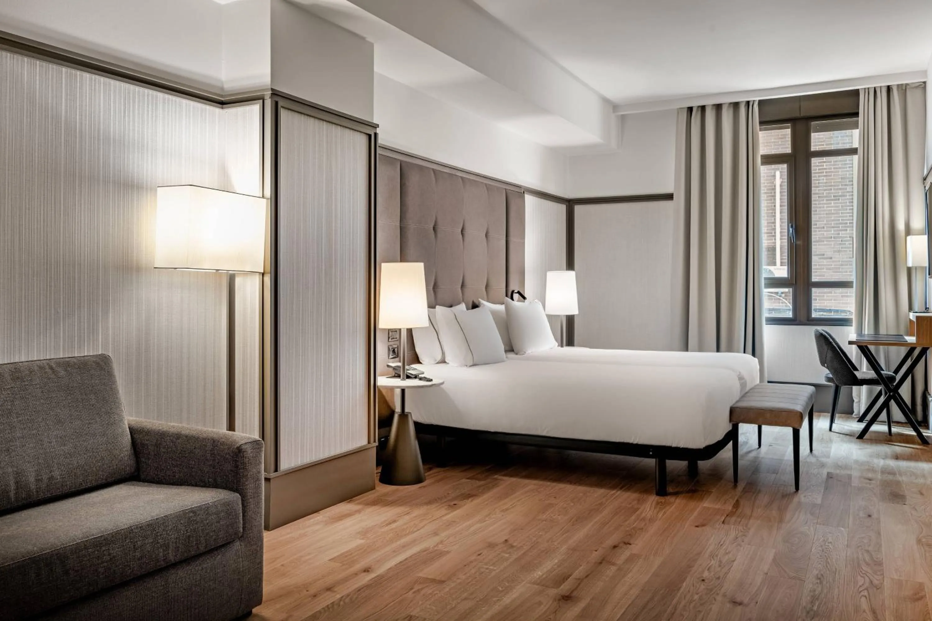 Photo of the whole room, Bed in AC Hotel Avenida de América by Marriott