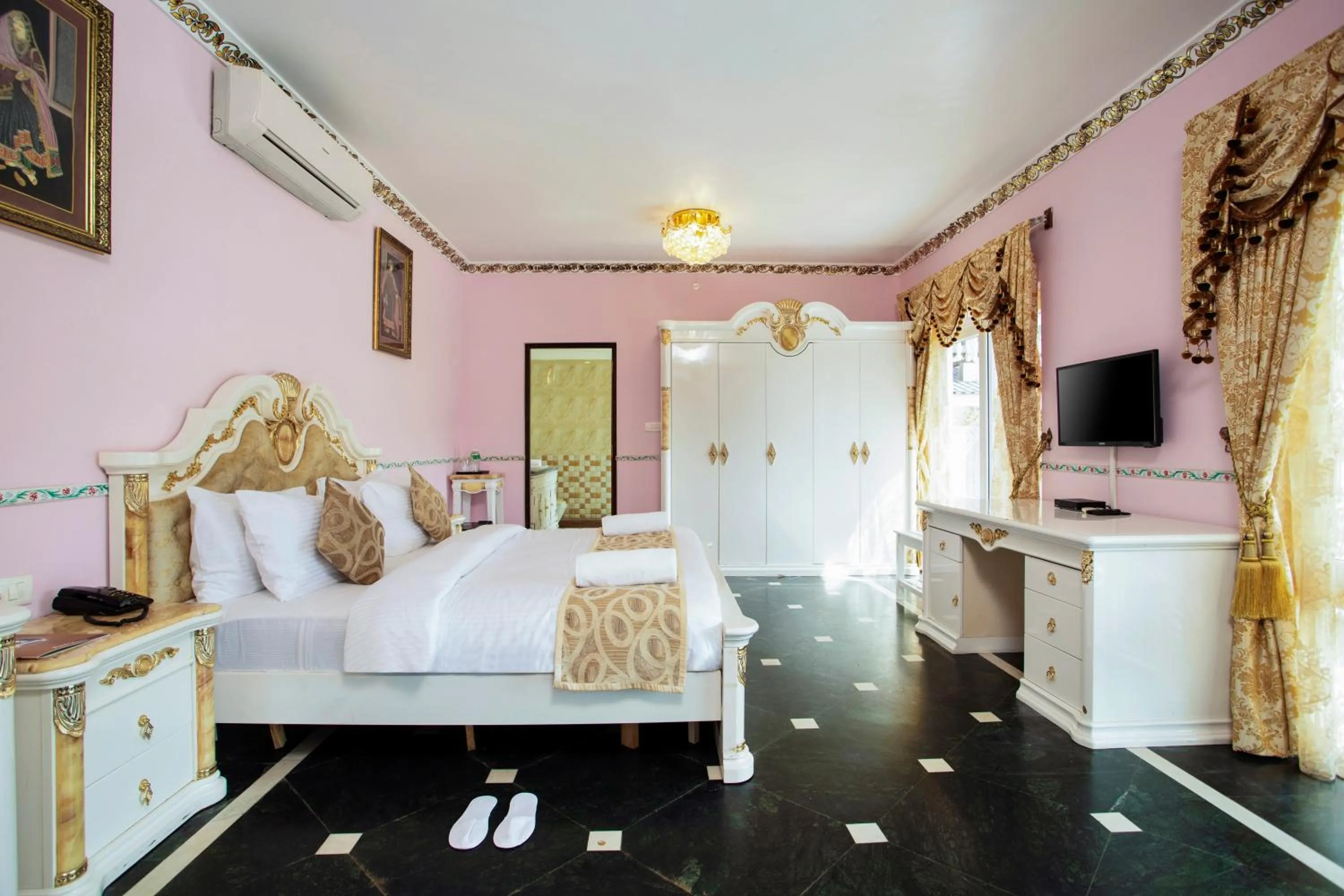 Bed in Stone Wood Riverfront Resort, Siolim