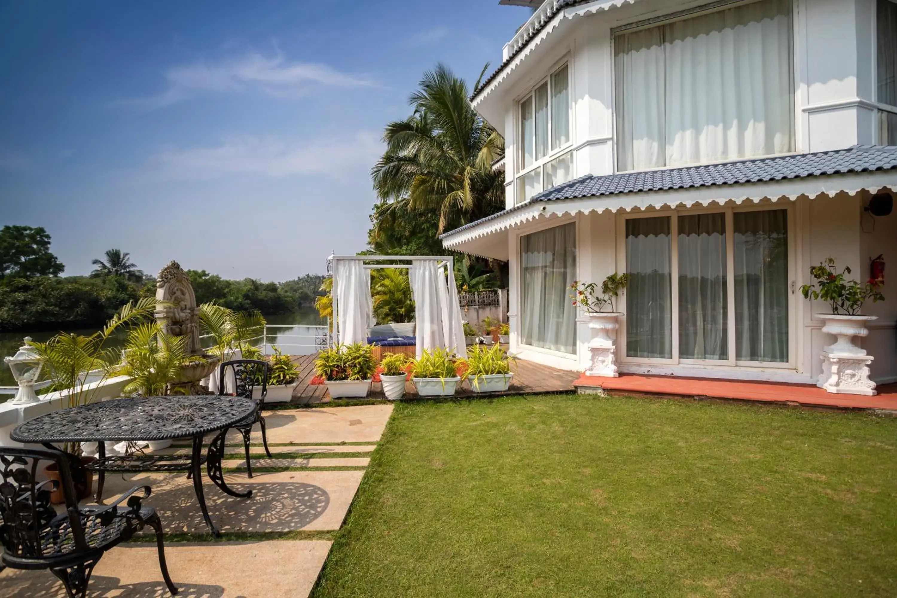 Garden view in Stone Wood Riverfront Resort, Siolim Garden view in Stone Wood Riverfront Resort, Siolim