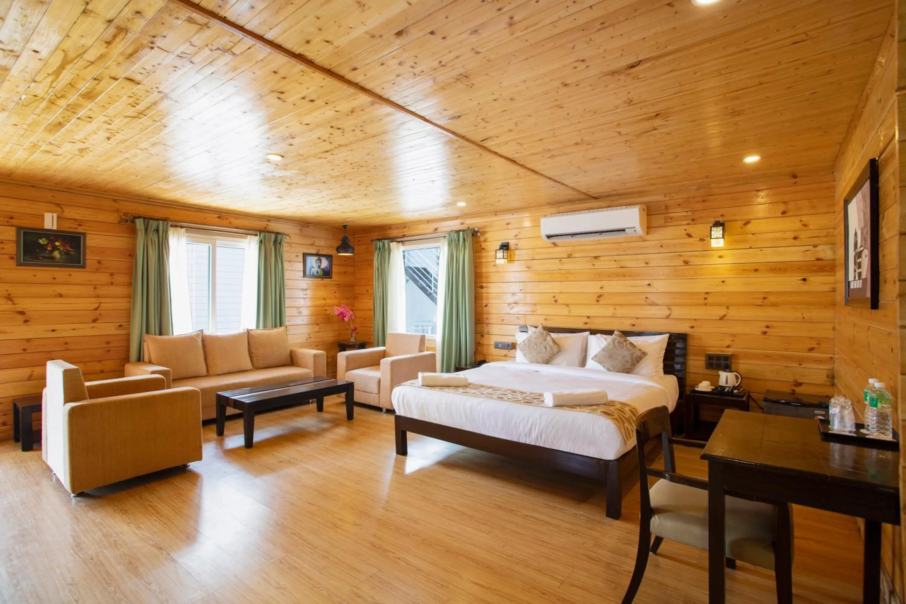 Bed in Stone Wood Riverfront Resort, Siolim