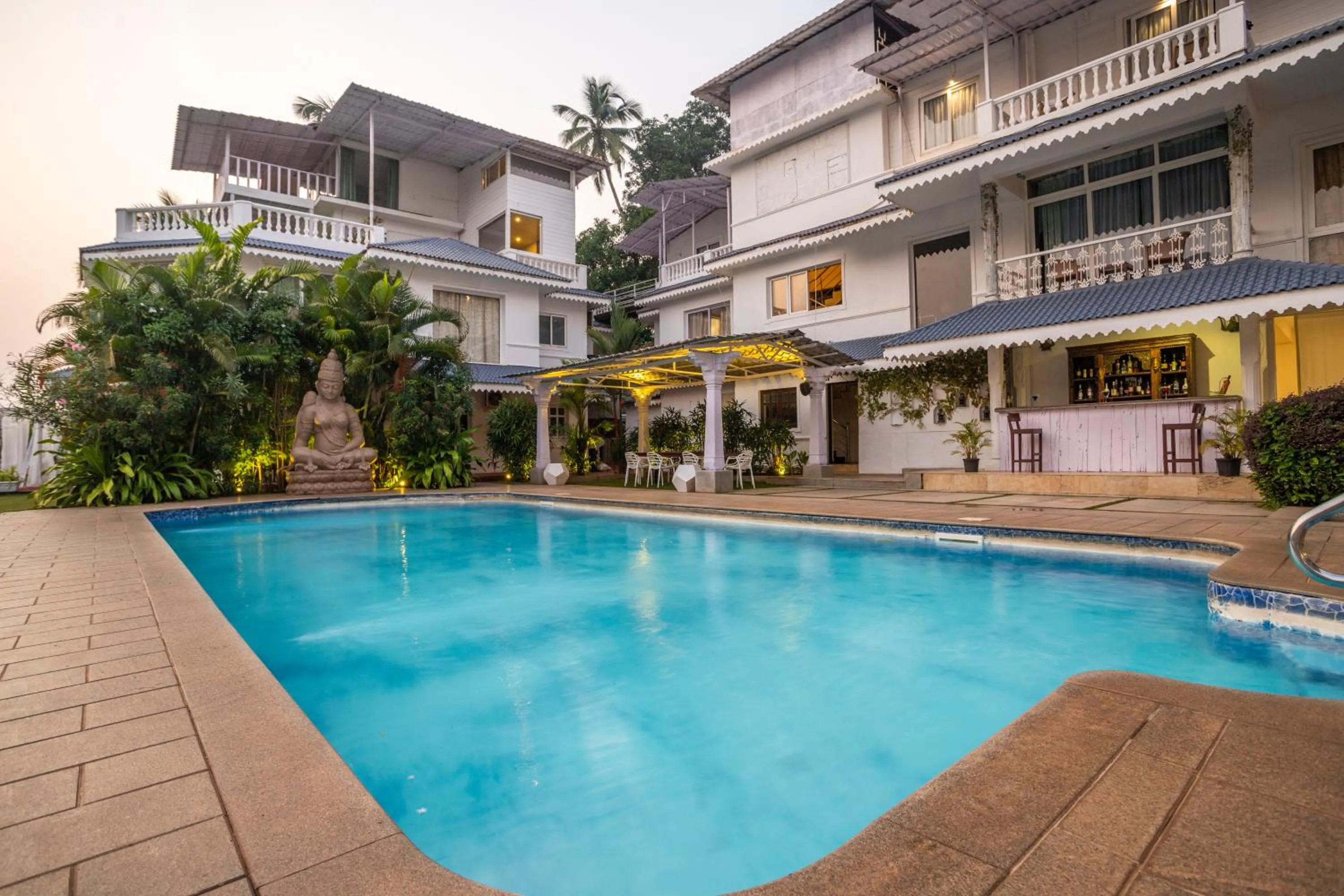 Swimming pool in Stone Wood Riverfront Resort, Siolim