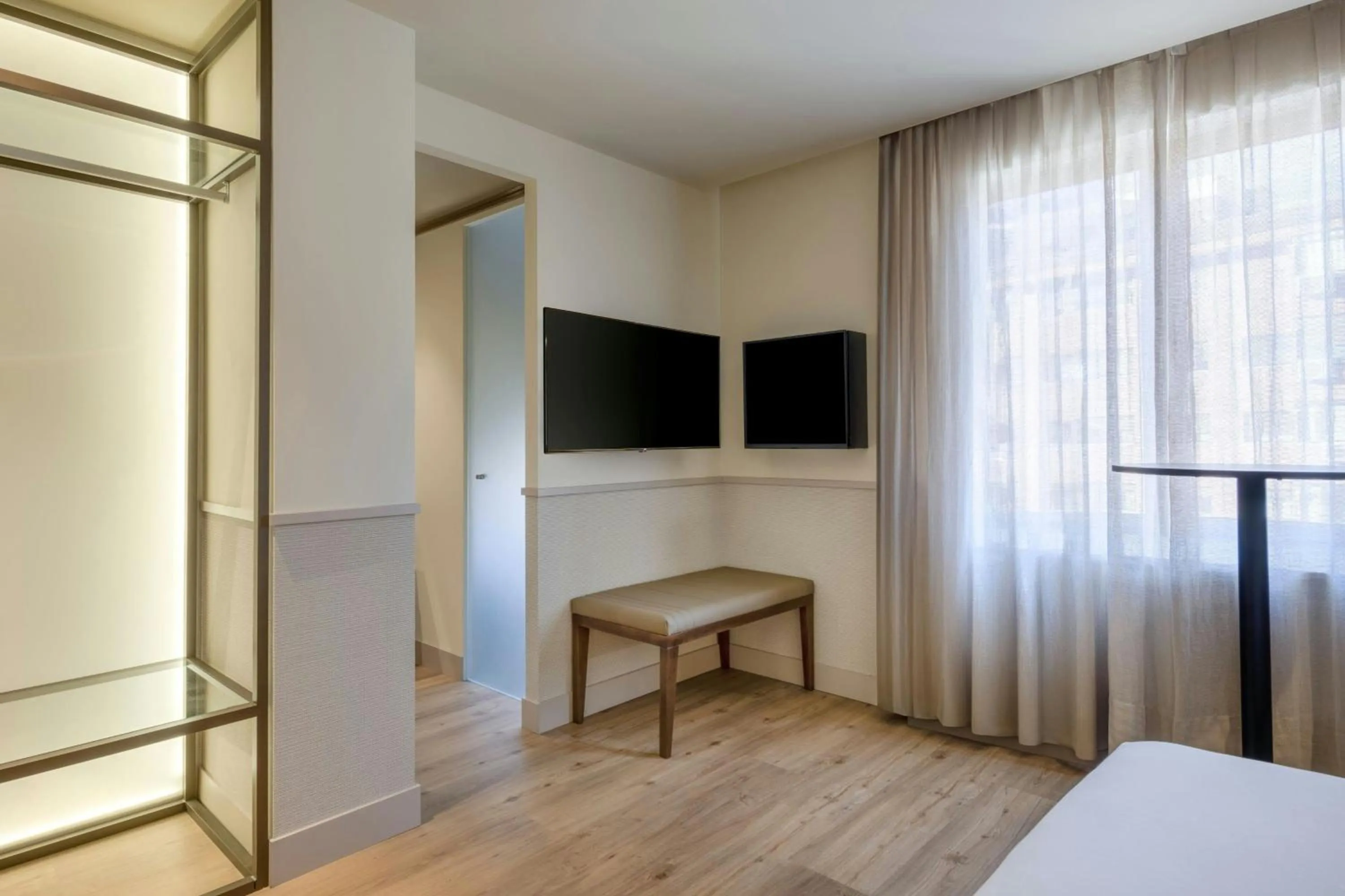 Photo of the whole room, Bed in AC Hotel Los Vascos by Marriott