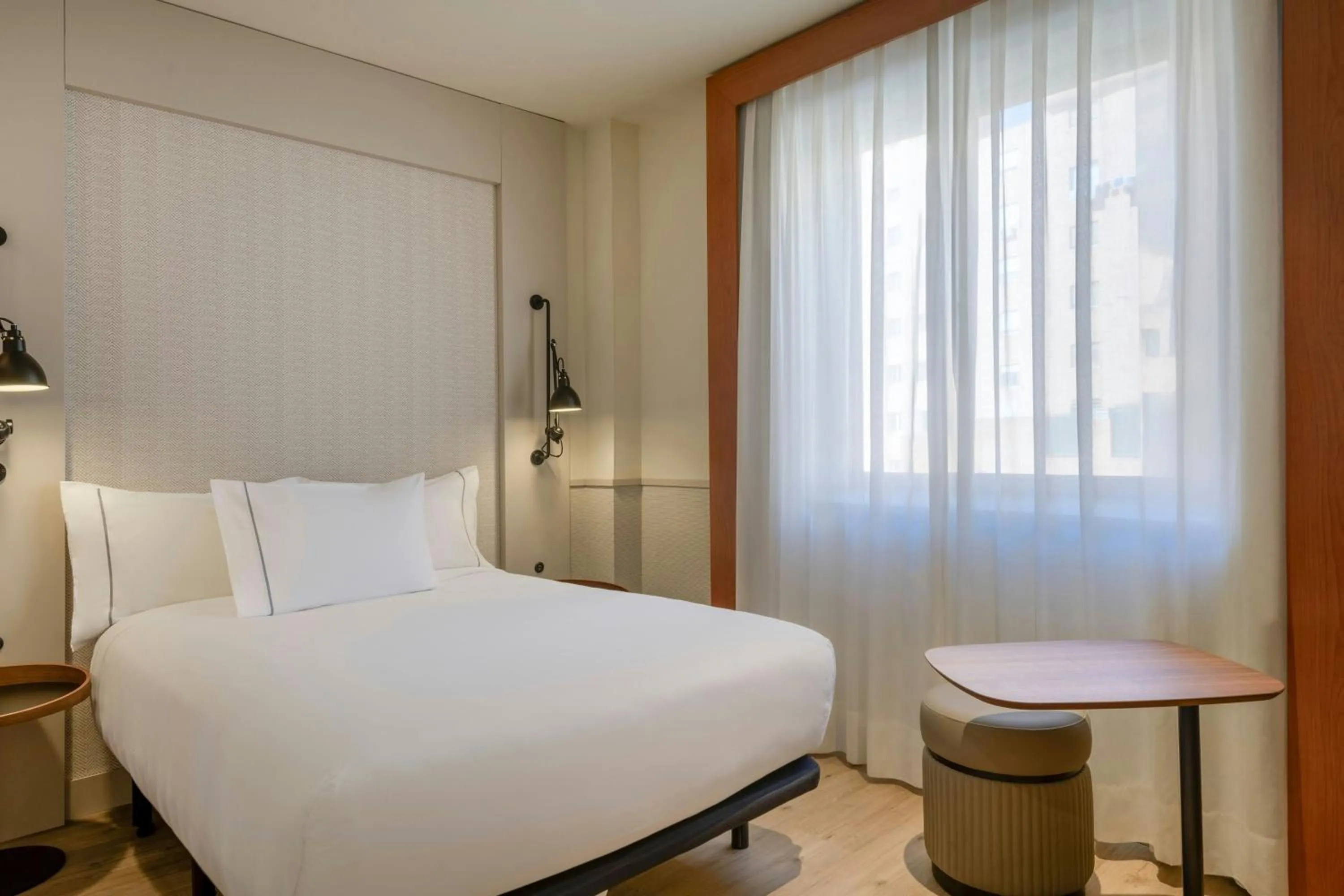 Photo of the whole room, Bed in AC Hotel Los Vascos by Marriott