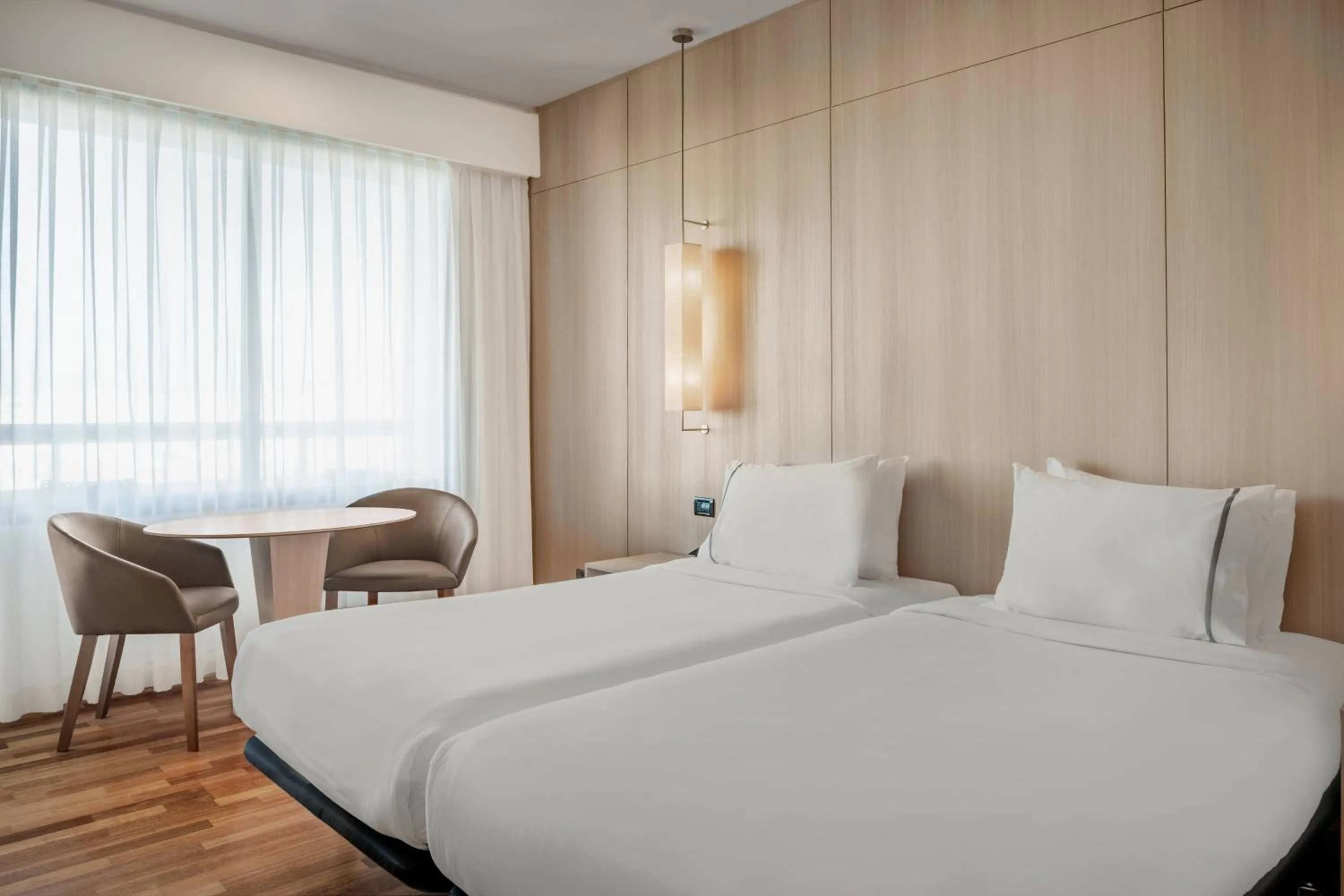 Photo of the whole room, Bed in AC Hotel Málaga Palacio by Marriott