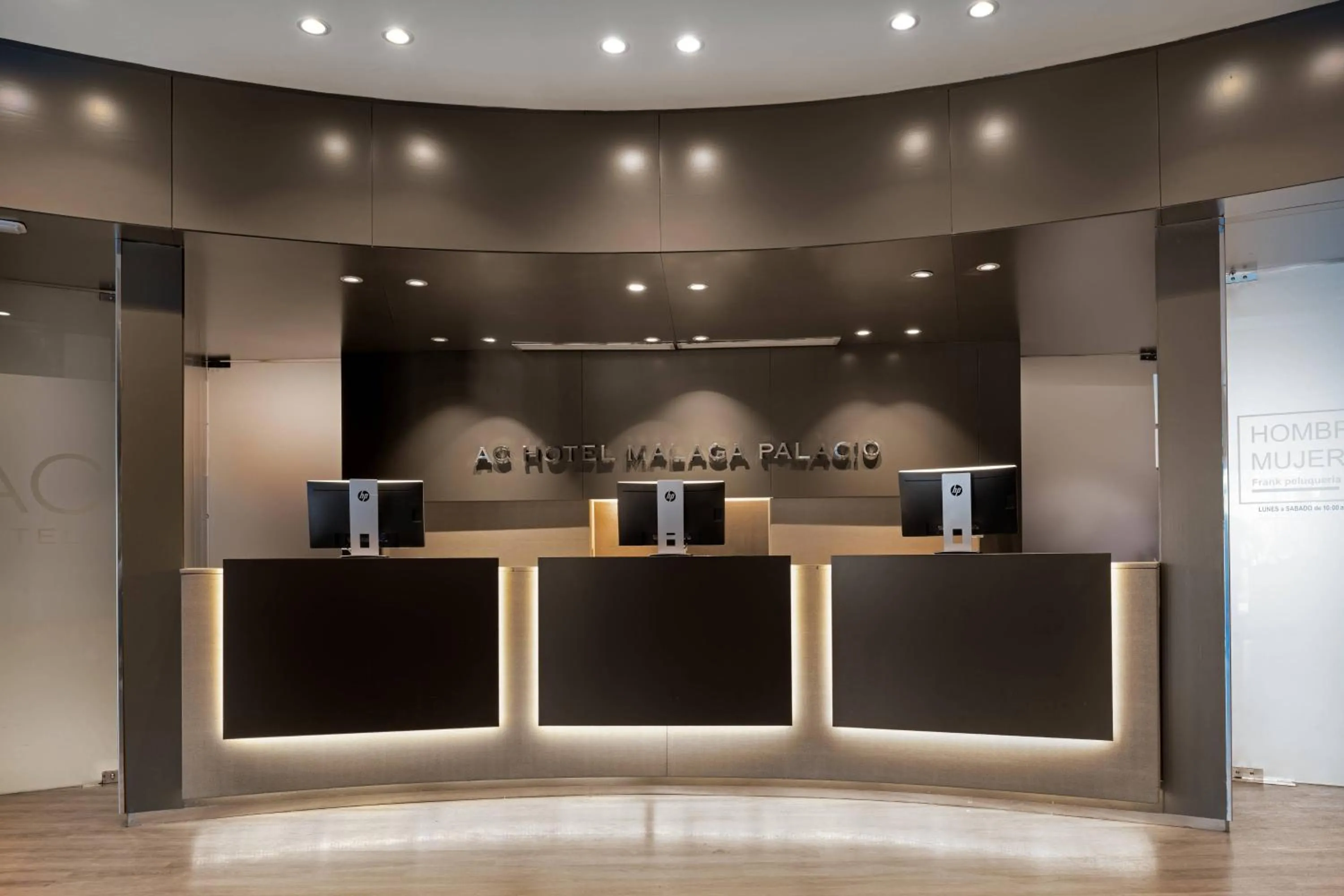 Lobby or reception in AC Hotel Málaga Palacio by Marriott