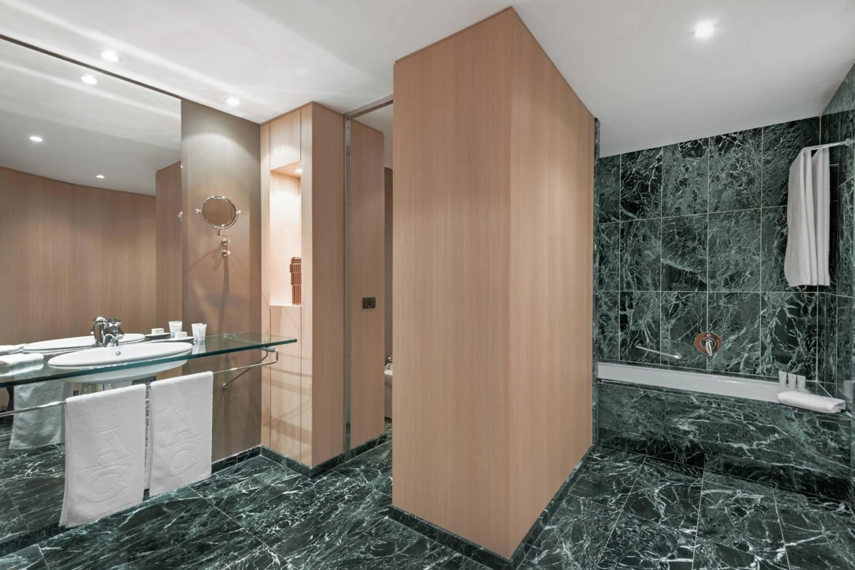 Bathroom in AC Hotel Málaga Palacio by Marriott