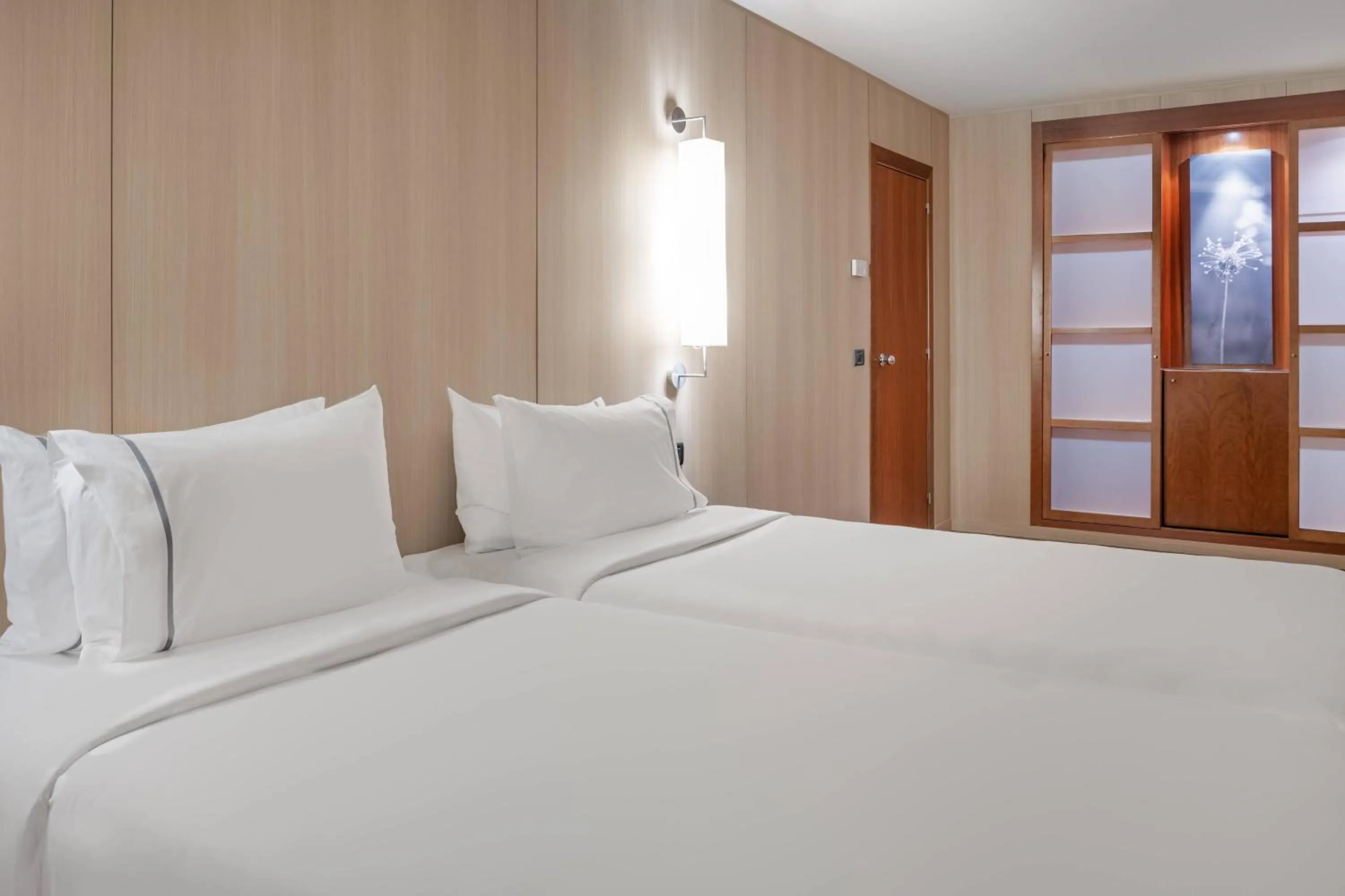 Photo of the whole room, Bed in AC Hotel Málaga Palacio by Marriott