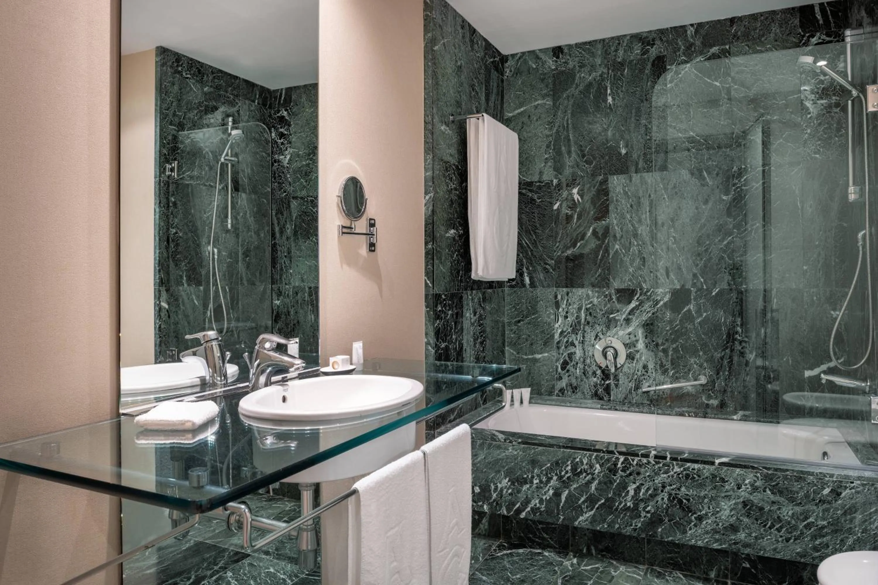 Bathroom in AC Hotel Málaga Palacio by Marriott