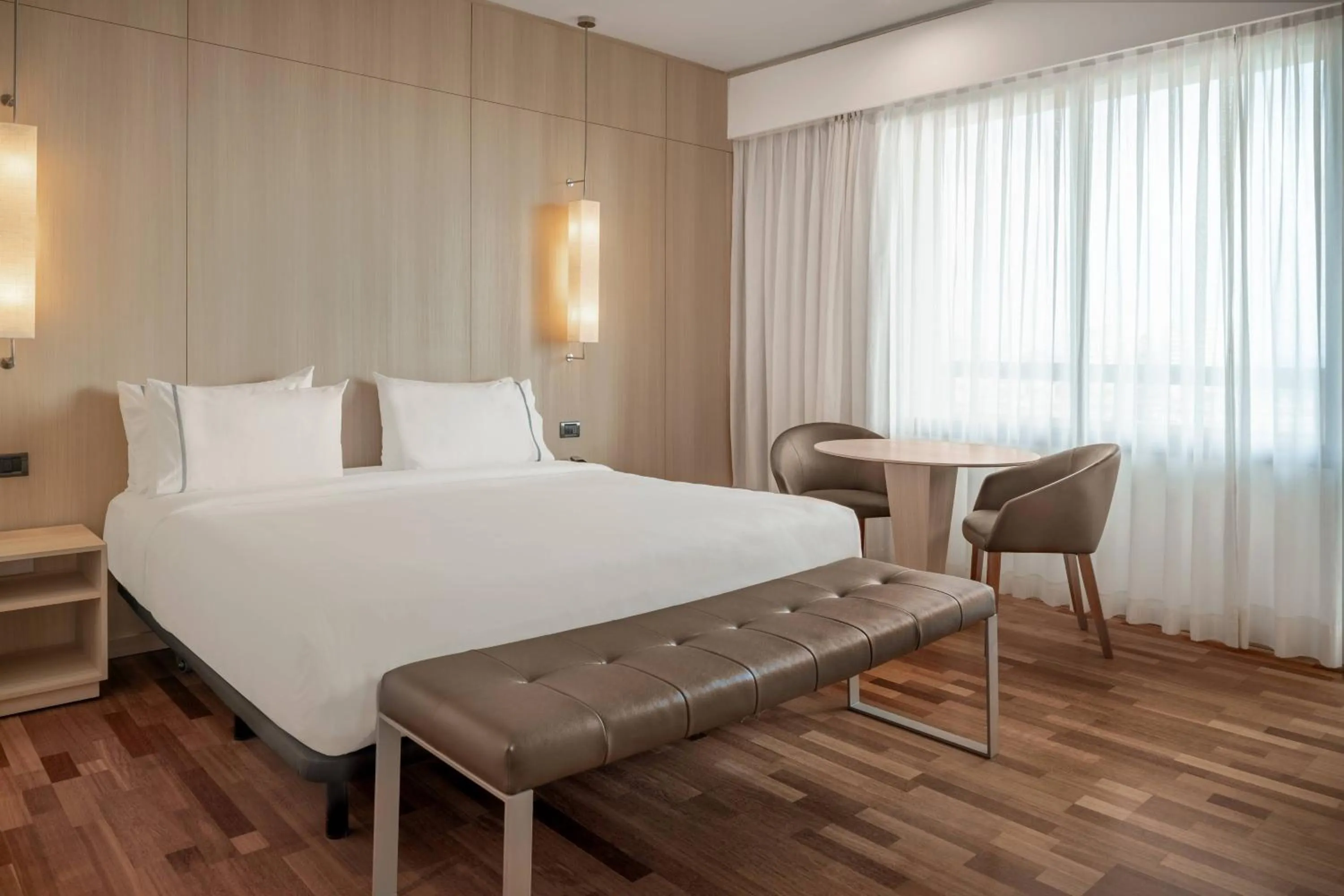 Photo of the whole room, Bed in AC Hotel Málaga Palacio by Marriott