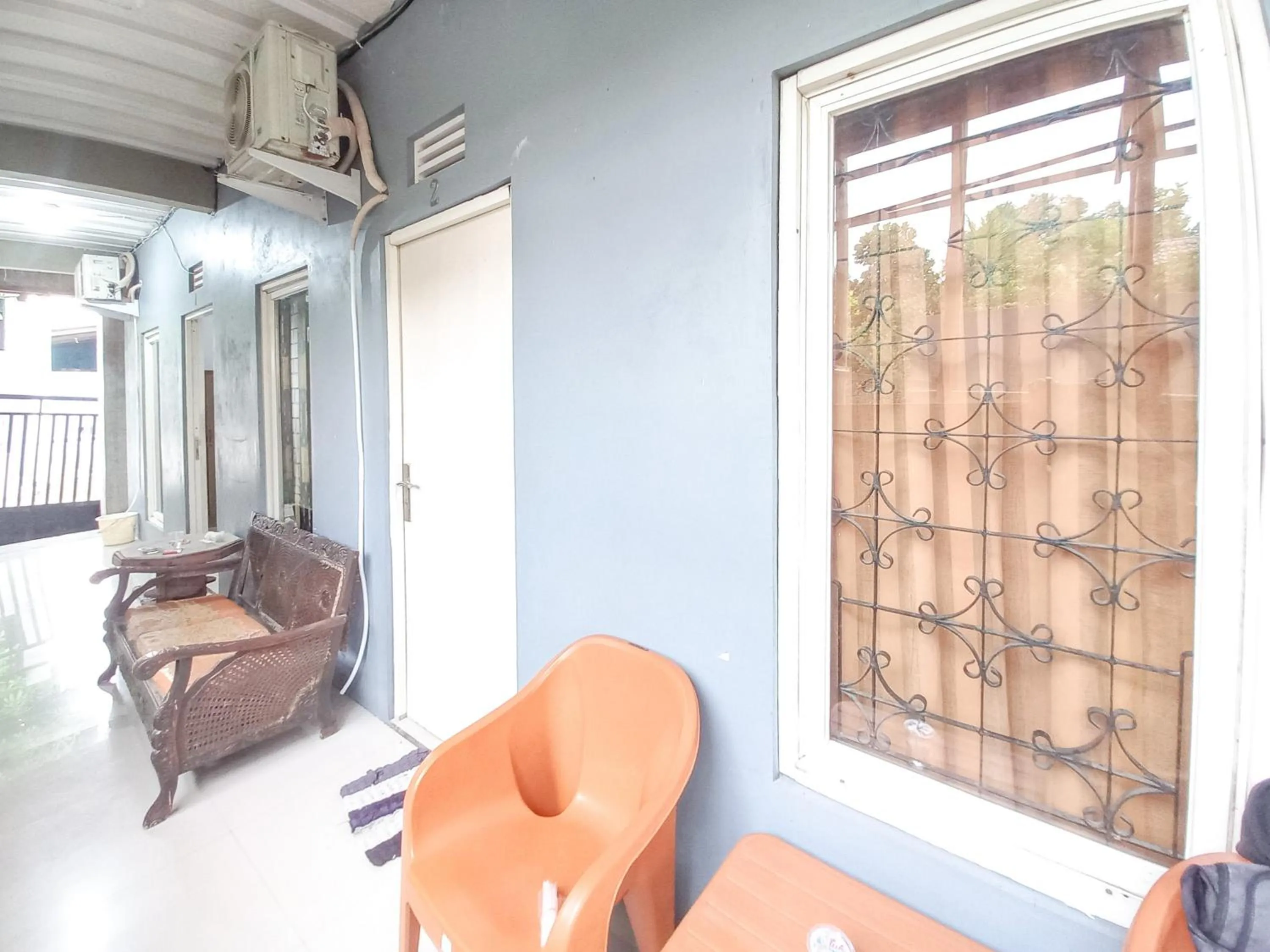 Seating area in Alif House Syariah Redpartner near Taman Dayu Pandaan