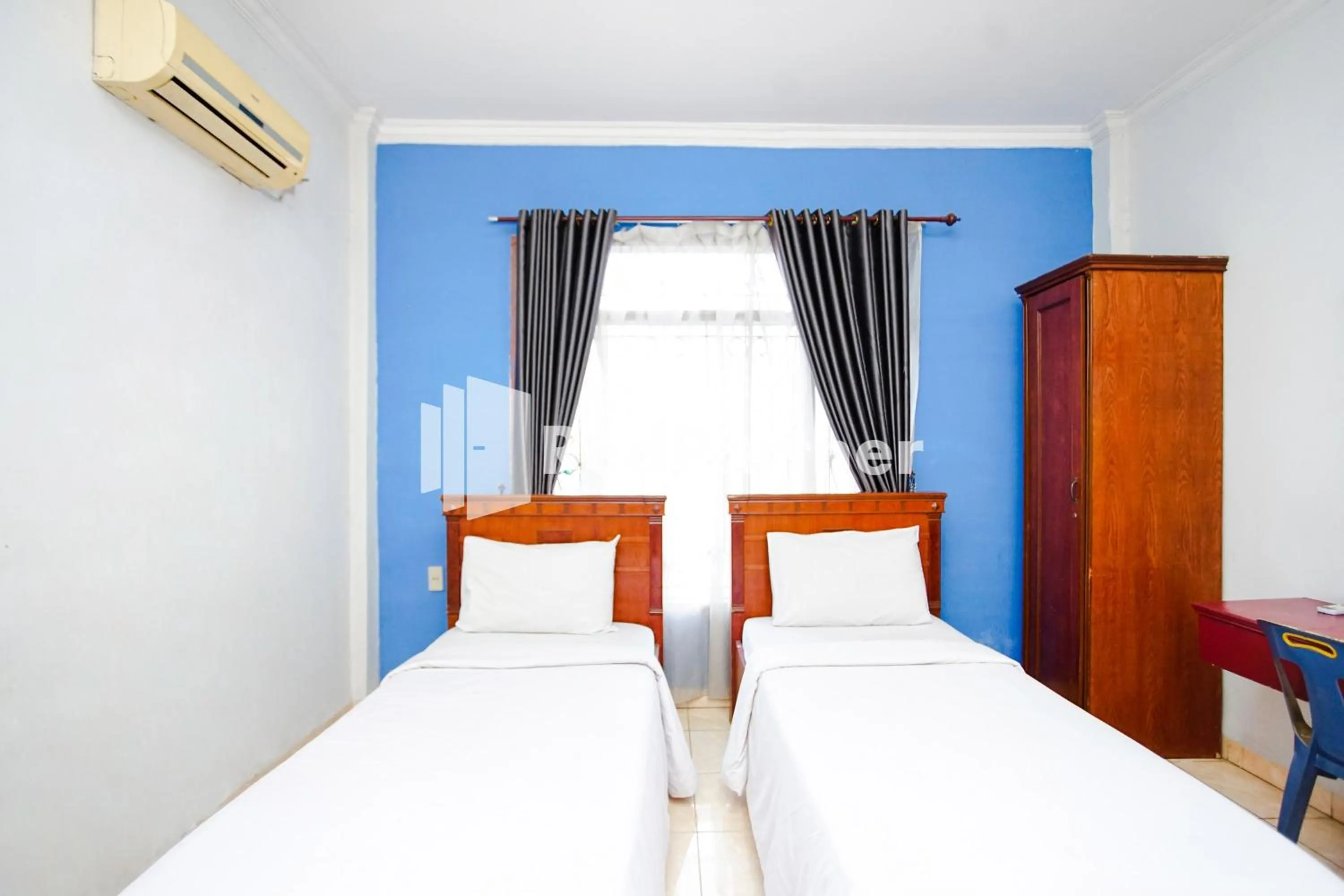 Bed in Hotel Serena Anggrek near Manhattan Times Square Mall Medan RedPartner
