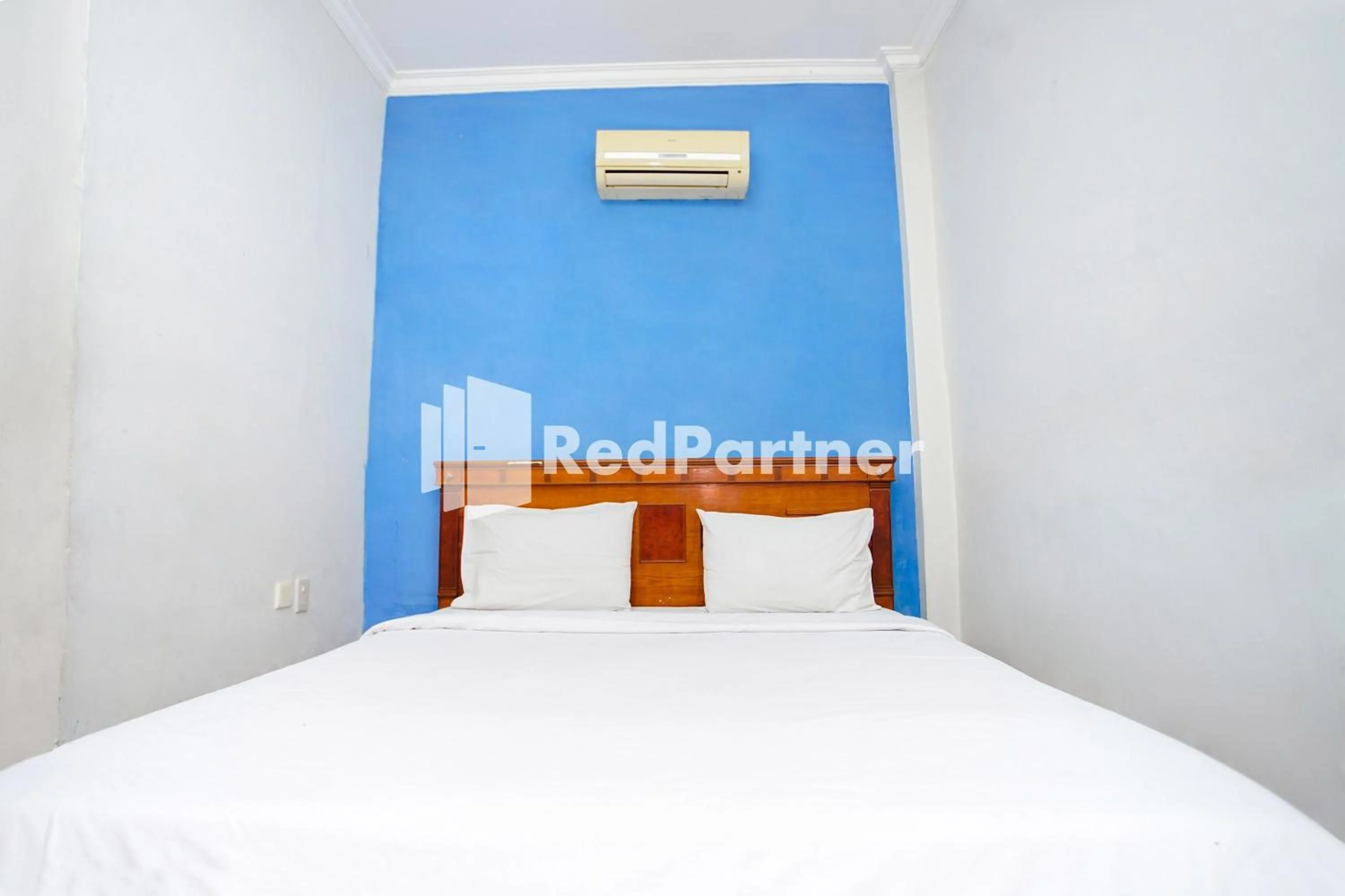 Bed in Hotel Serena Anggrek near Manhattan Times Square Mall Medan RedPartner