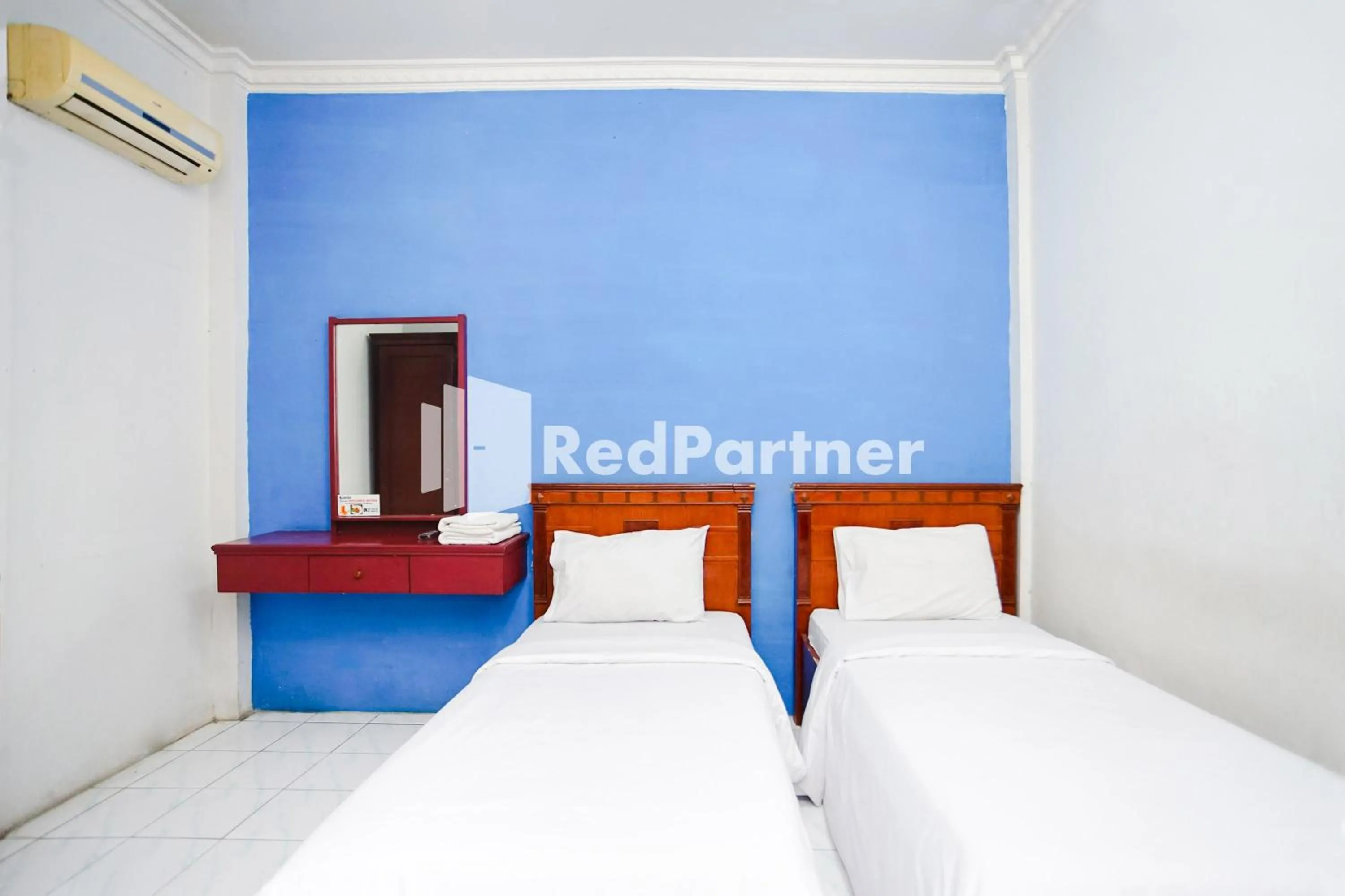 Bed in Hotel Serena Anggrek near Manhattan Times Square Mall Medan RedPartner