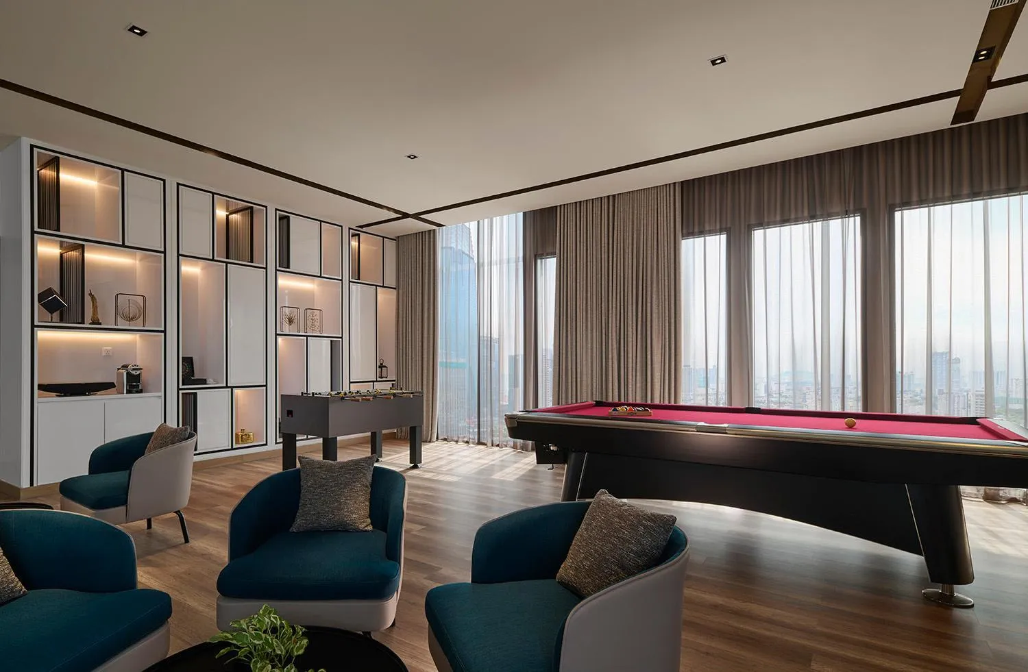 Communal lounge/ TV room in Pan Pacific Serviced Suites Kuala Lumpur