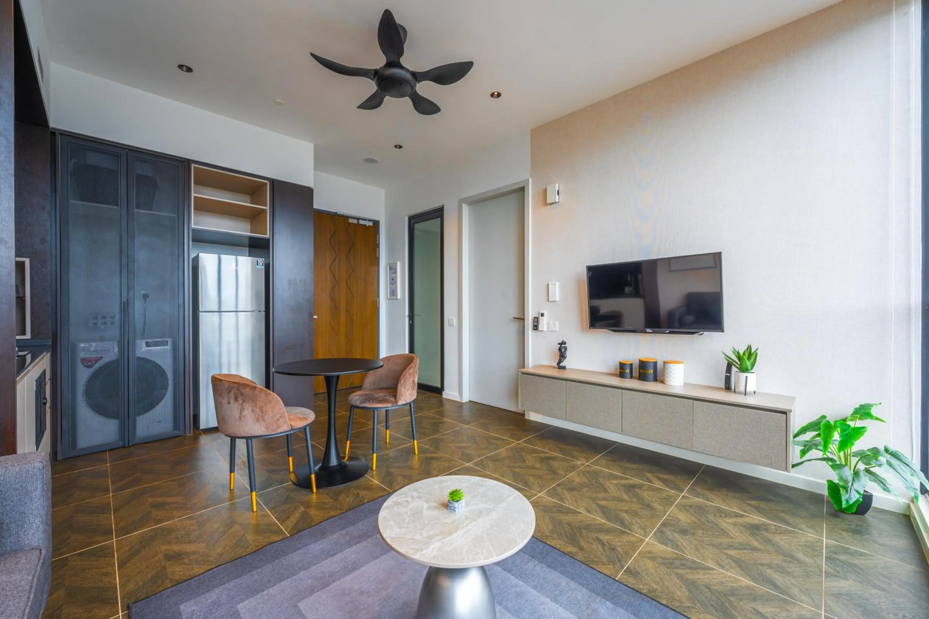 Living room in Greystone Scarletz Suites