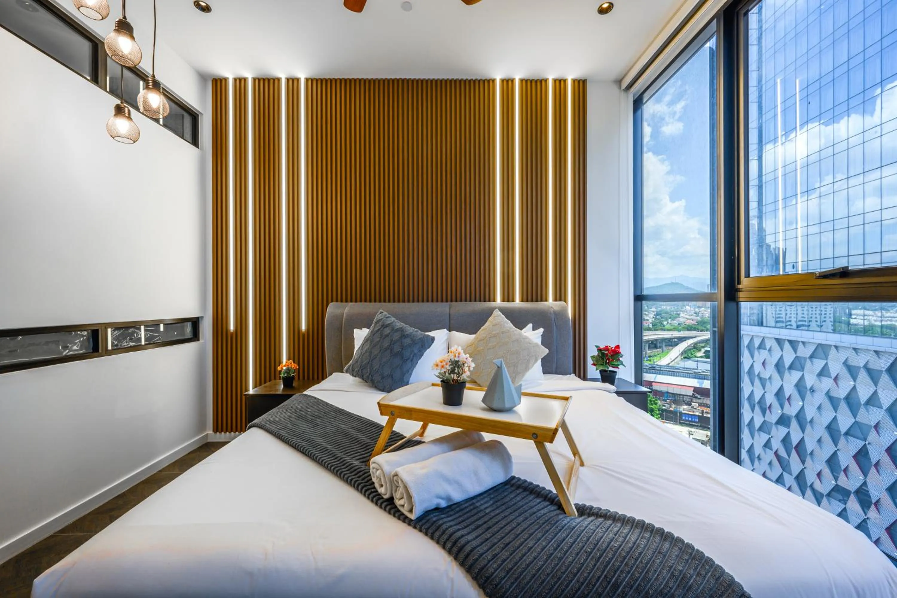 Bed in Greystone Scarletz Suites