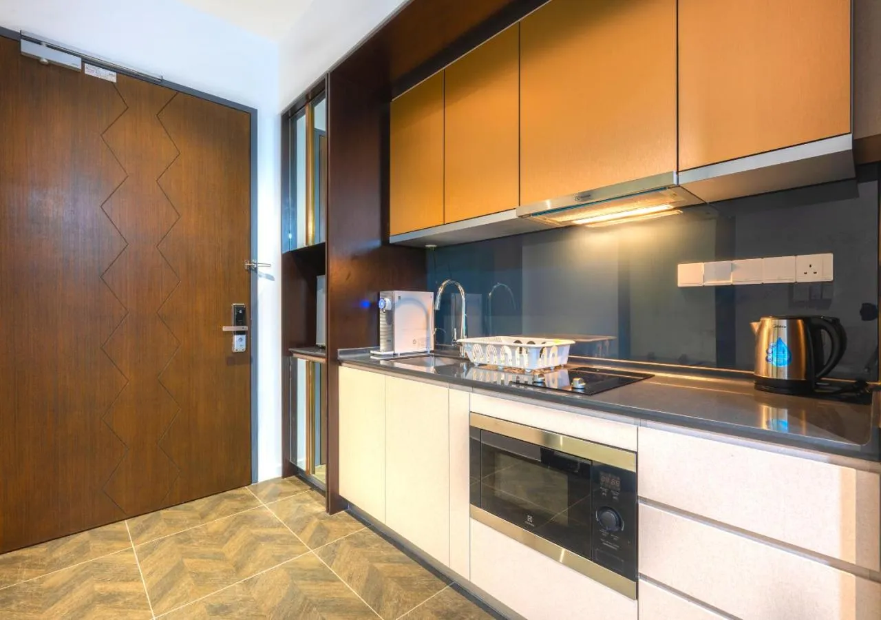 Kitchen or kitchenette in Greystone Scarletz Suites