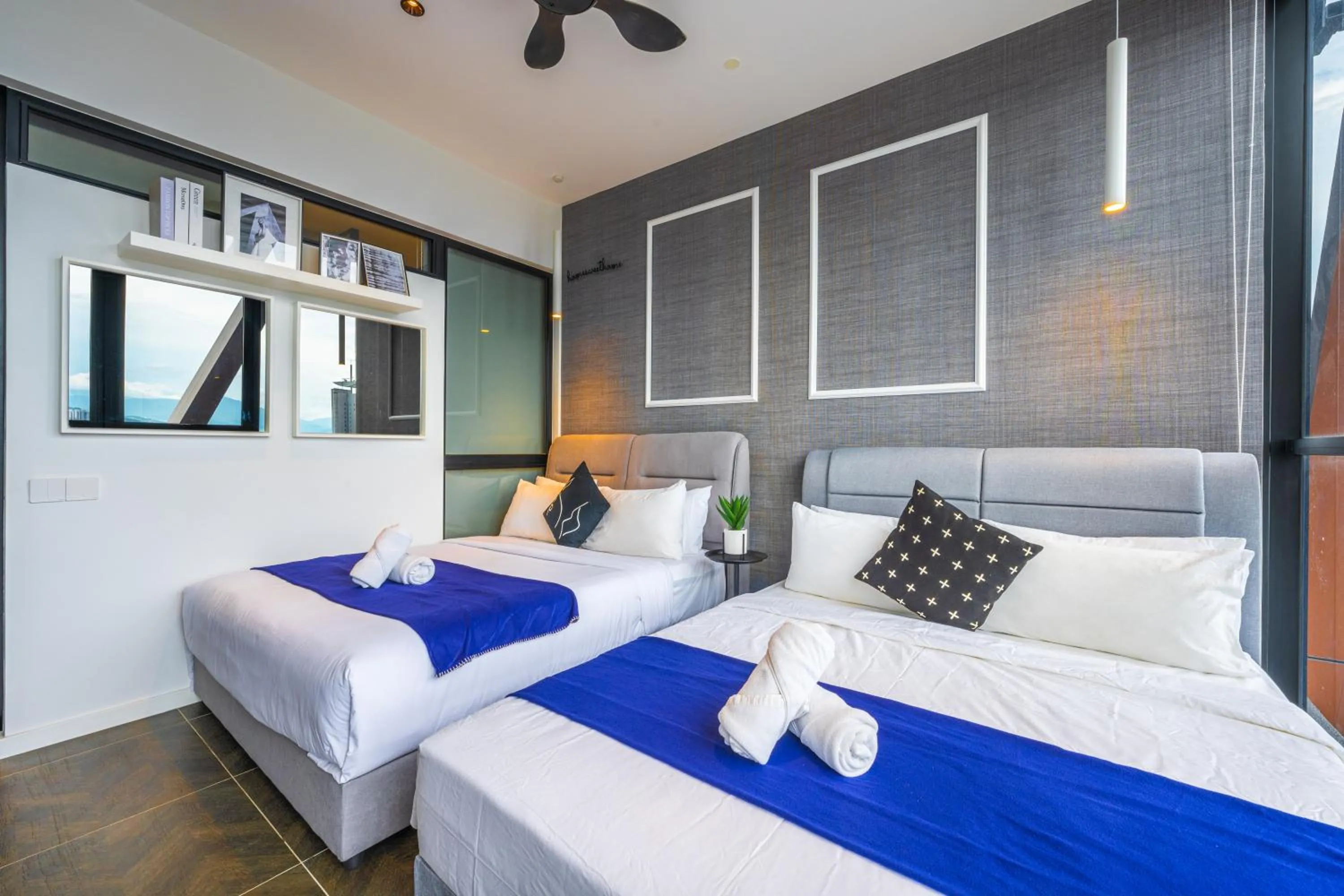 Bed in Greystone Scarletz Suites