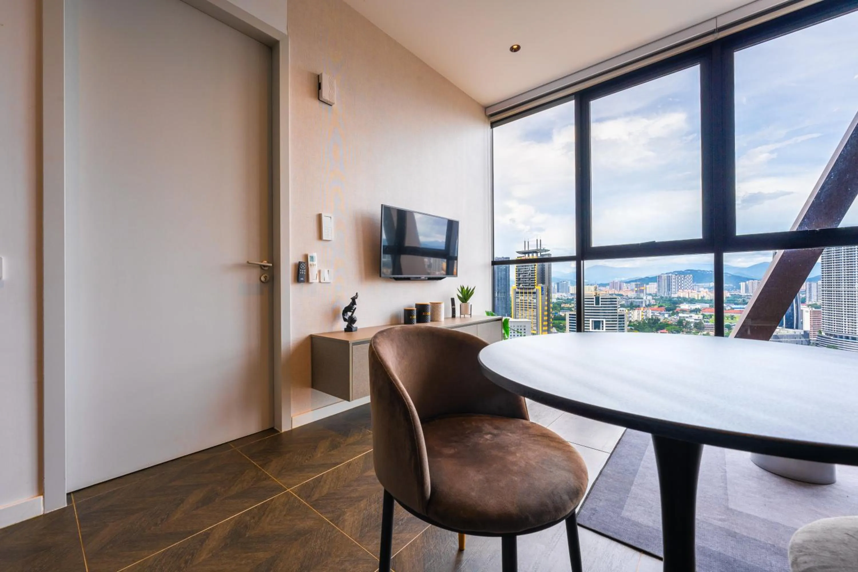Living room in Greystone Scarletz Suites