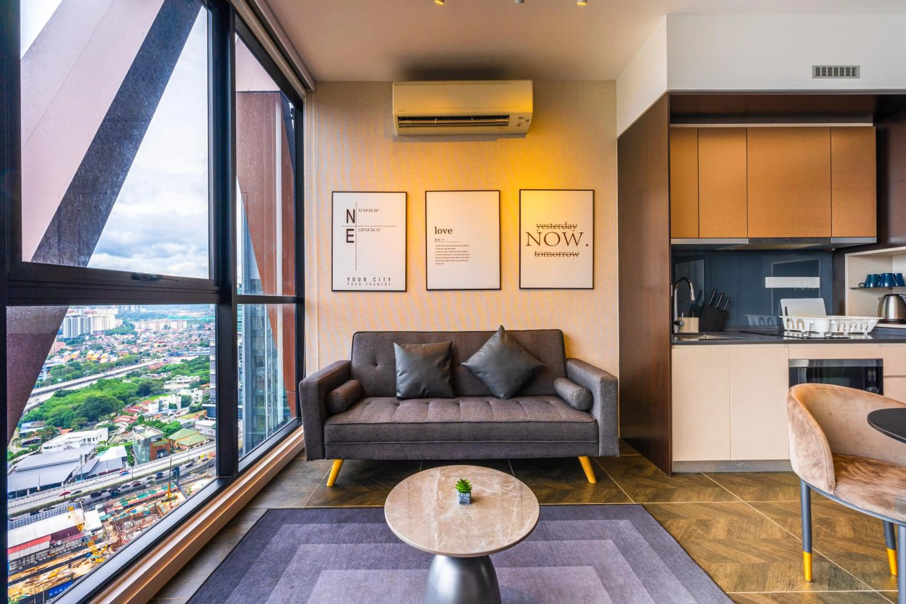 Living room in Greystone Scarletz Suites