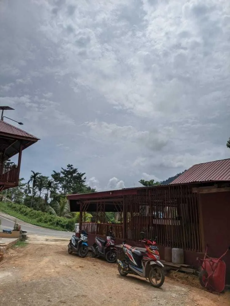 Facade/entrance in EXPRESS O 91702 Mandeh Homestay Syariah Near Bank Nagari PT Bank Pembangunan Daerah (BPD) Sumbar Cabang Painan