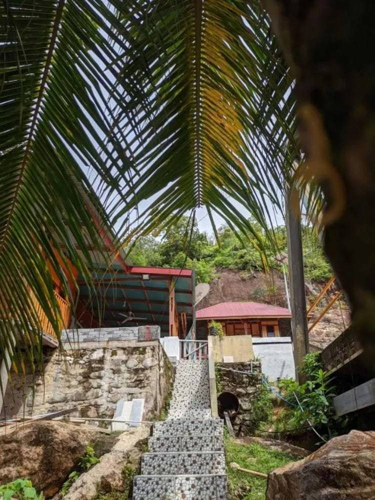 Facade/entrance in EXPRESS O 91702 Mandeh Homestay Syariah Near Bank Nagari PT Bank Pembangunan Daerah (BPD) Sumbar Cabang Painan