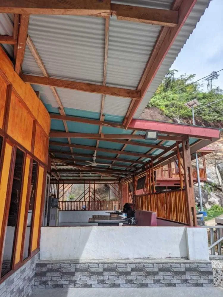 Facade/entrance in EXPRESS O 91702 Mandeh Homestay Syariah Near Bank Nagari PT Bank Pembangunan Daerah (BPD) Sumbar Cabang Painan