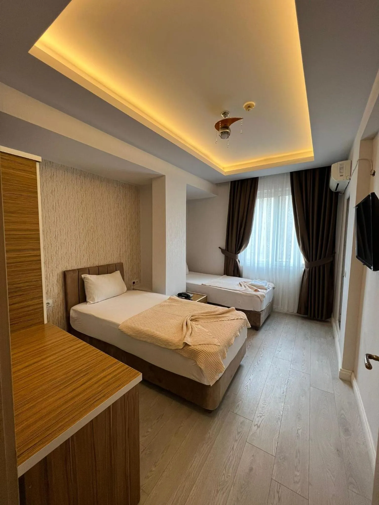 Bed in Grand Black Hotel