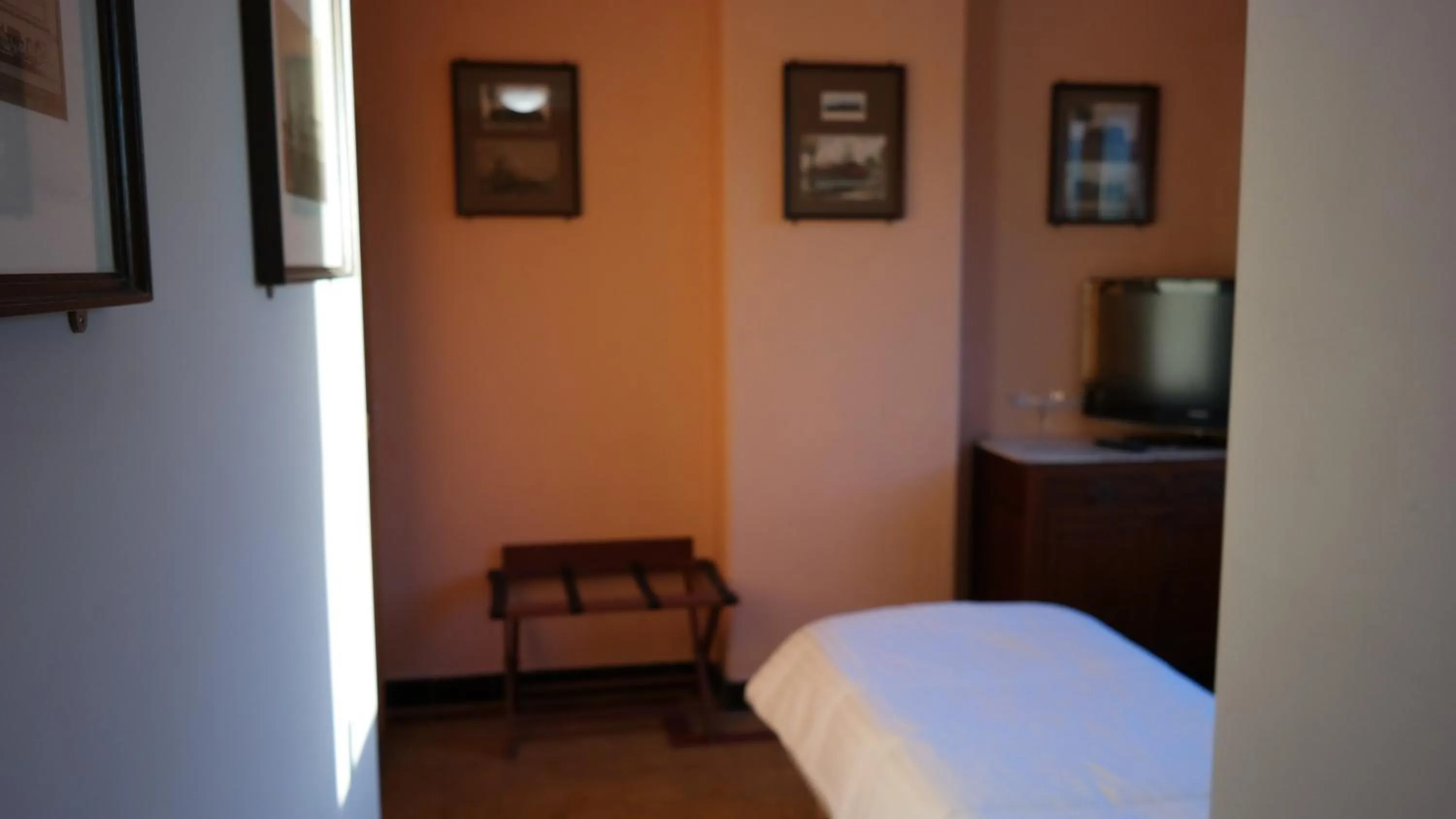 Bed in De Bonte Os Hotel & Tower