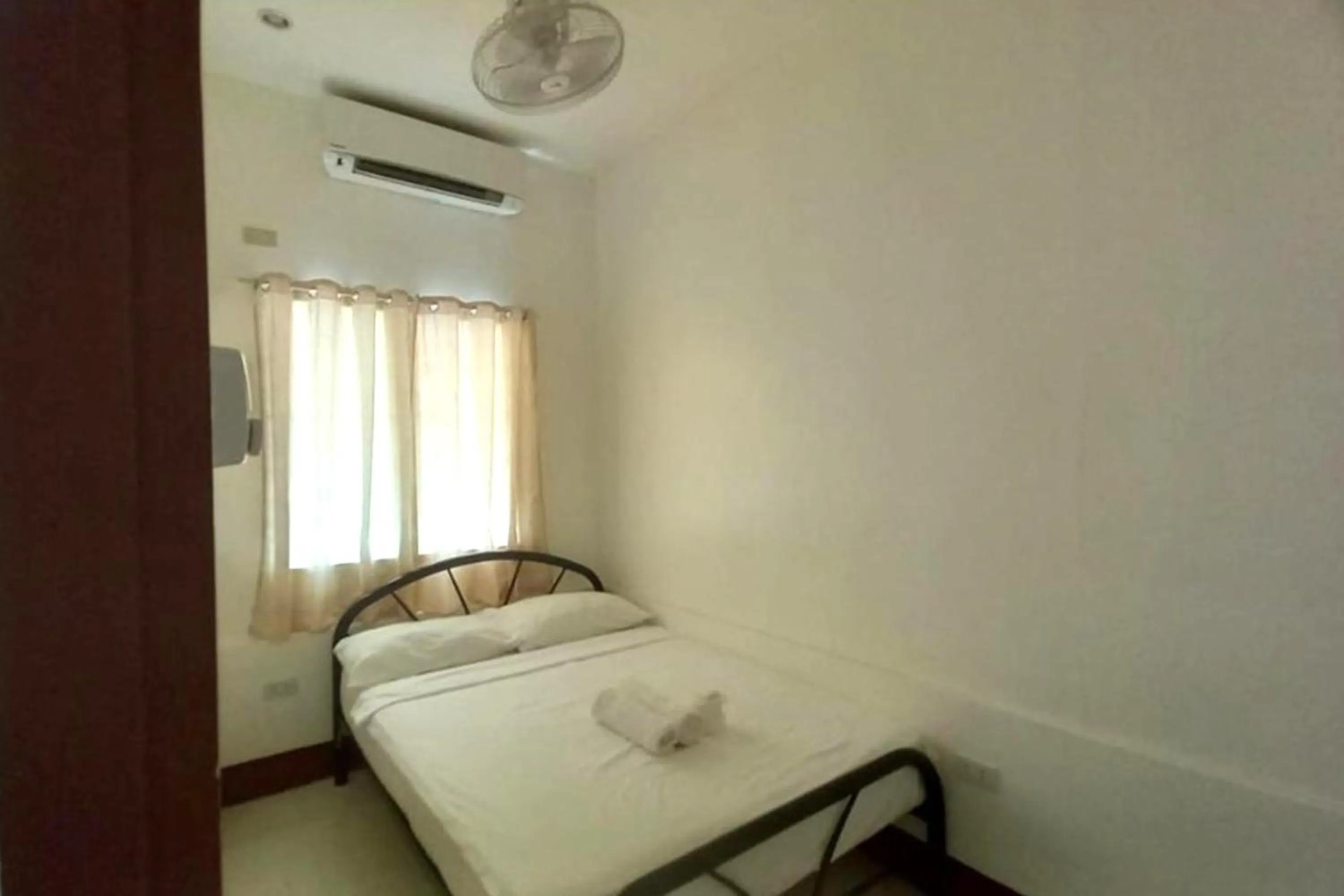 Bed in Palajuanders Inn Palawan