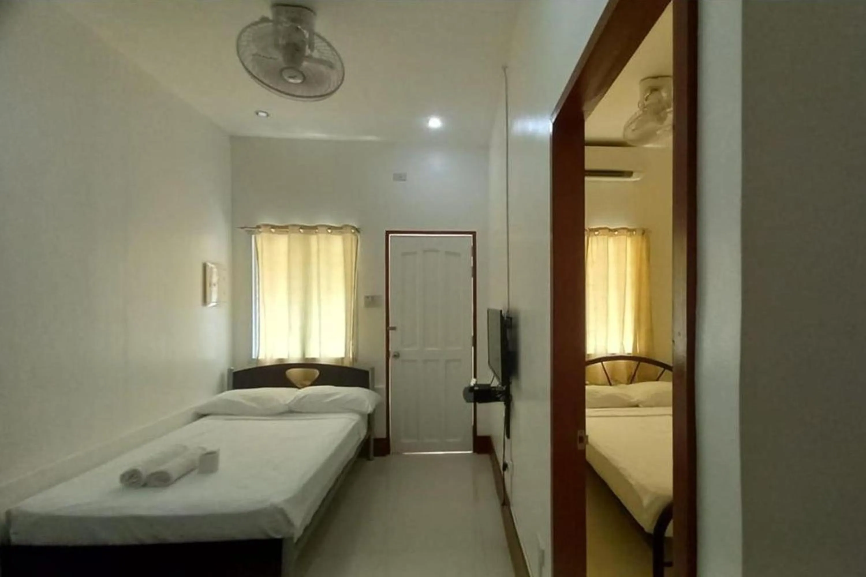 Bed in Palajuanders Inn Palawan