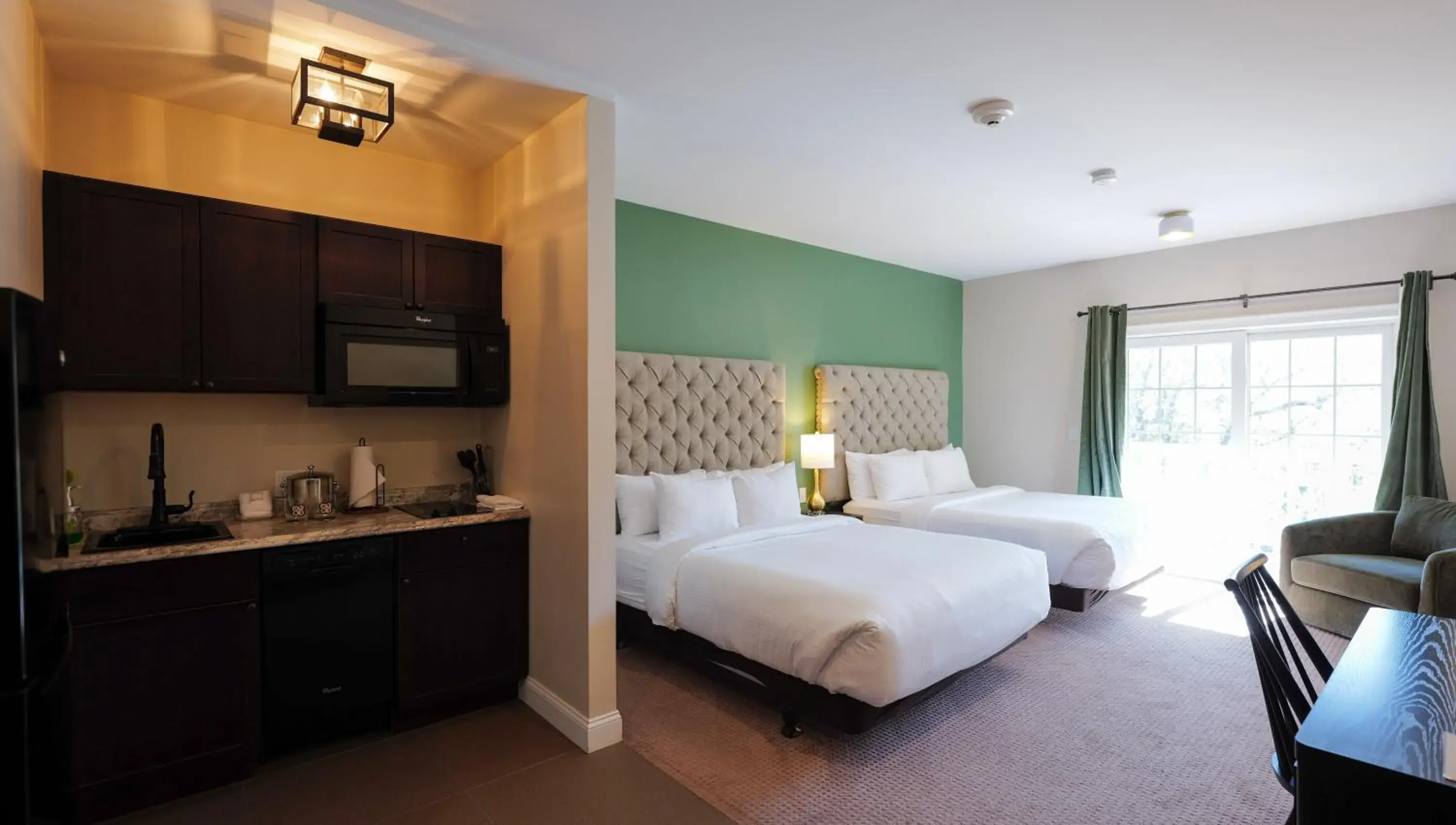 Courtyard Double Queen Kitchen Studio Room in On the River Inn Courtyard Double Queen Kitchen Studio Room in On the River Inn