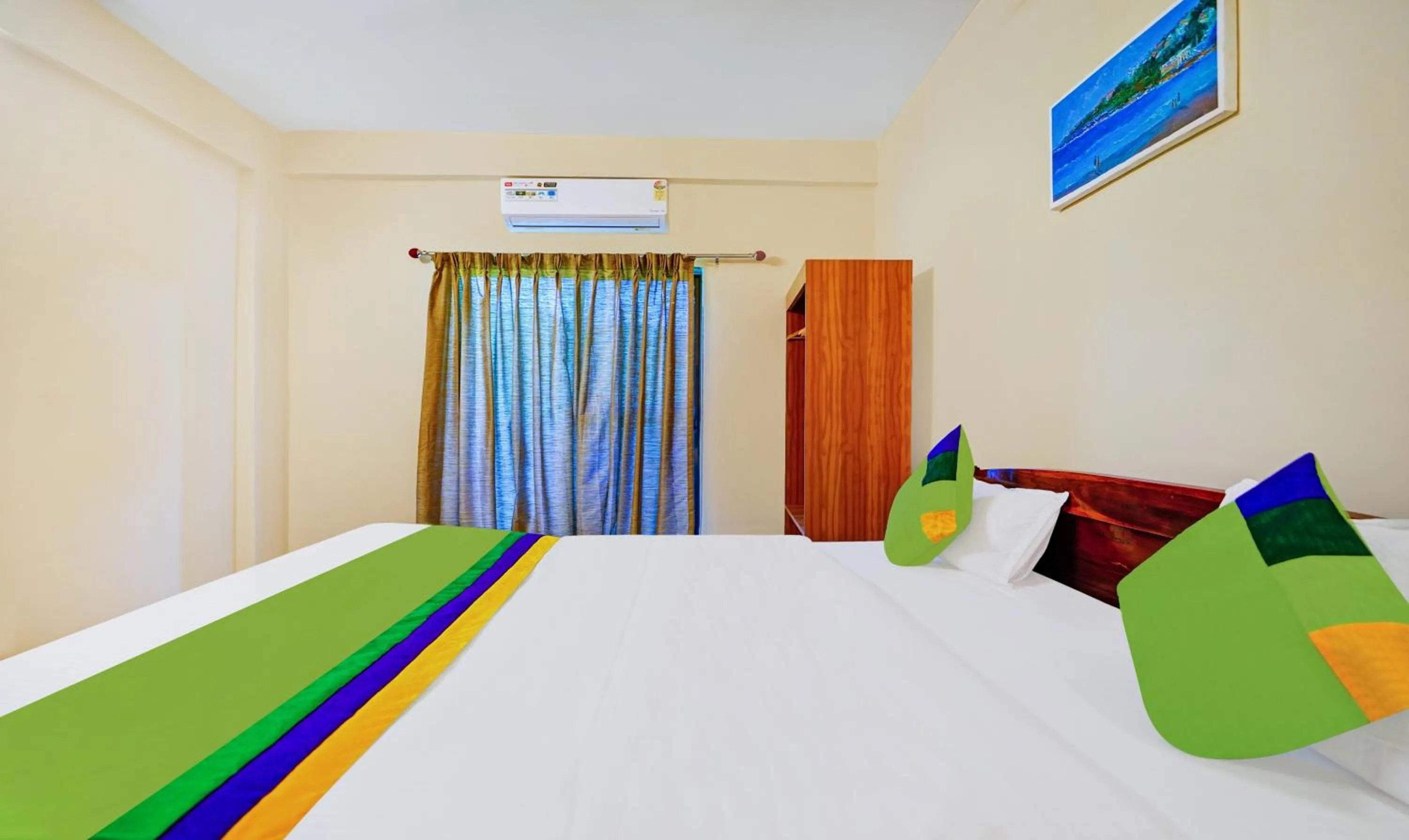 Bedroom, Bed in Treebo SS Residency With Mountain View