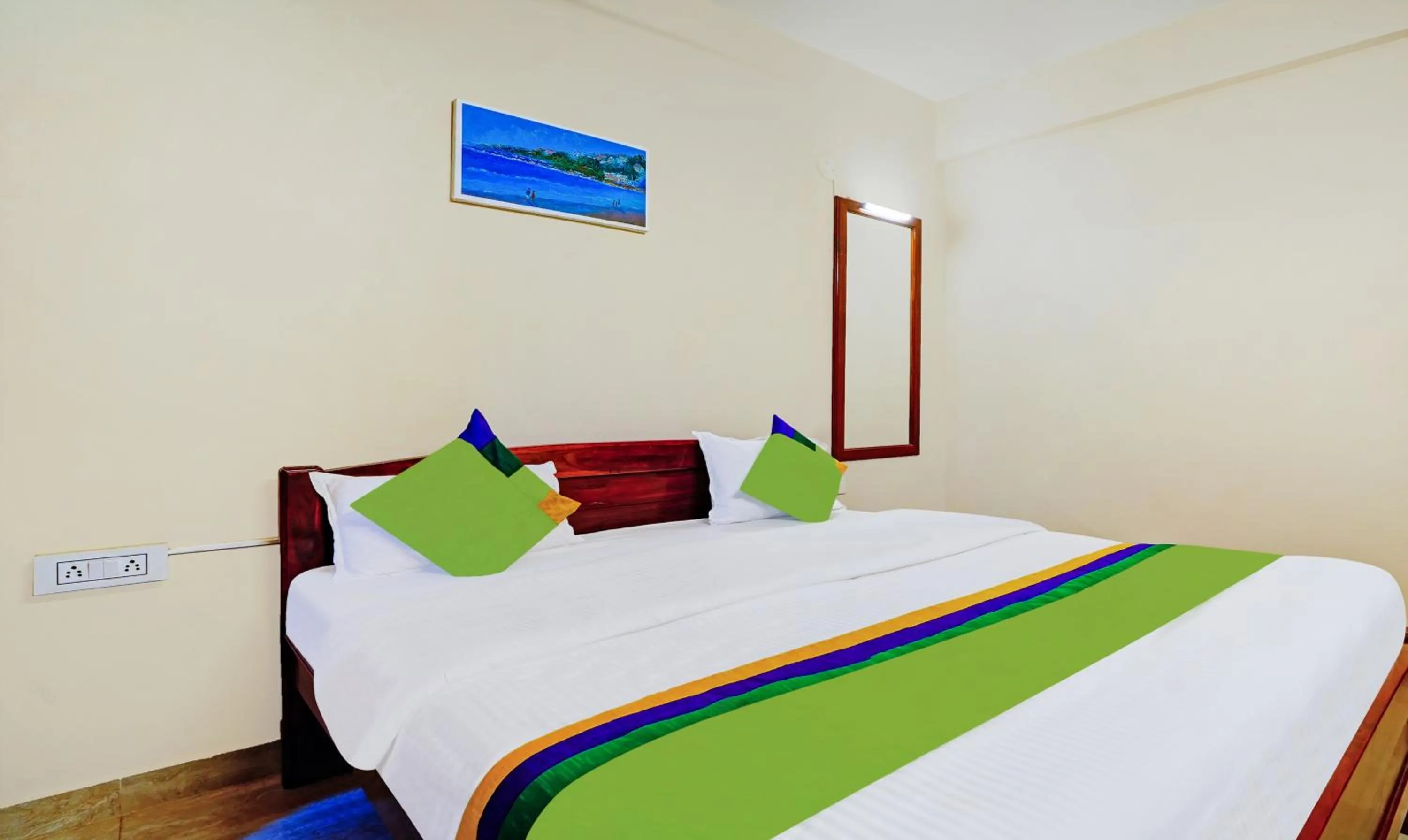 Bedroom, Bed in Treebo SS Residency With Mountain View