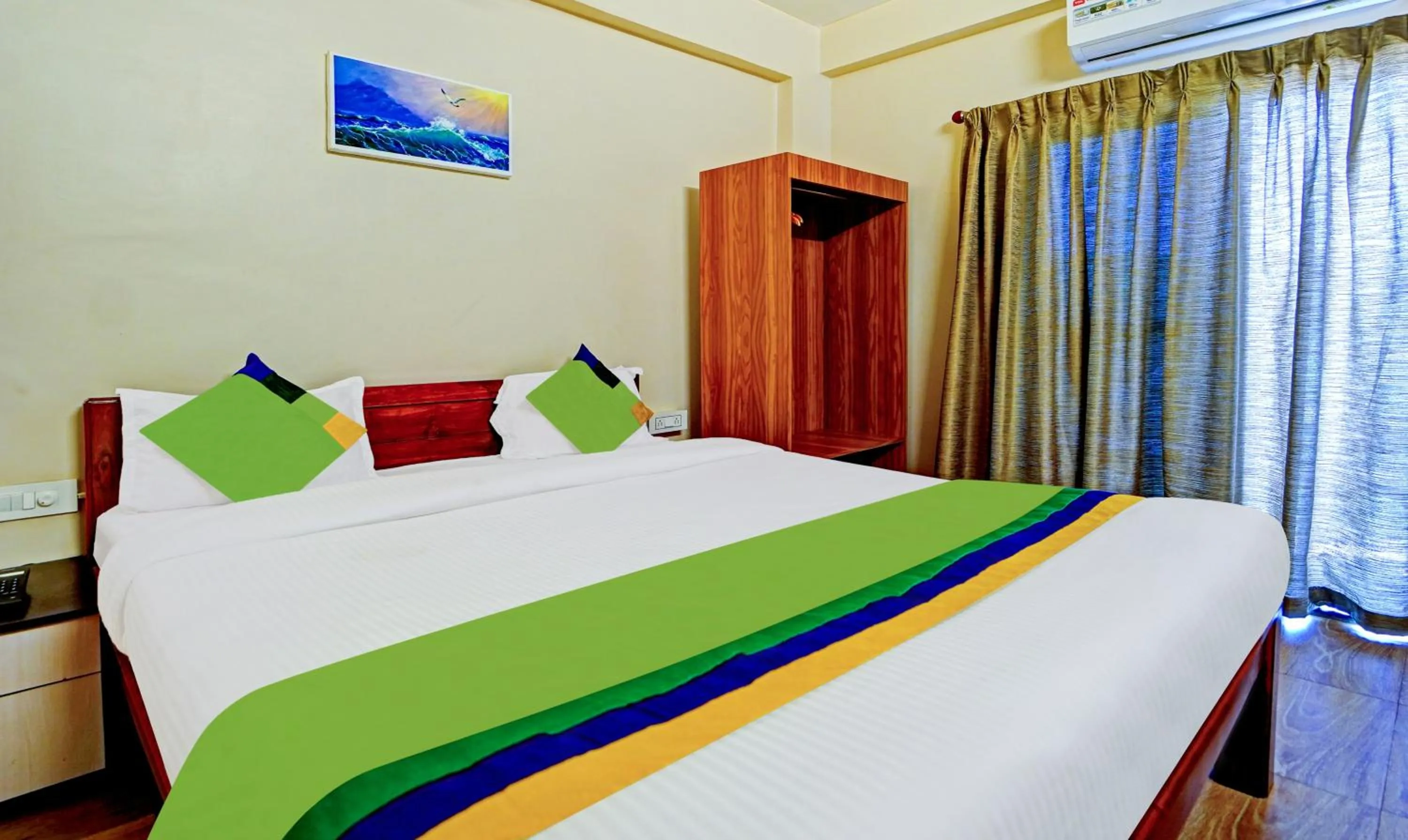 Bedroom, Bed in Treebo SS Residency With Mountain View