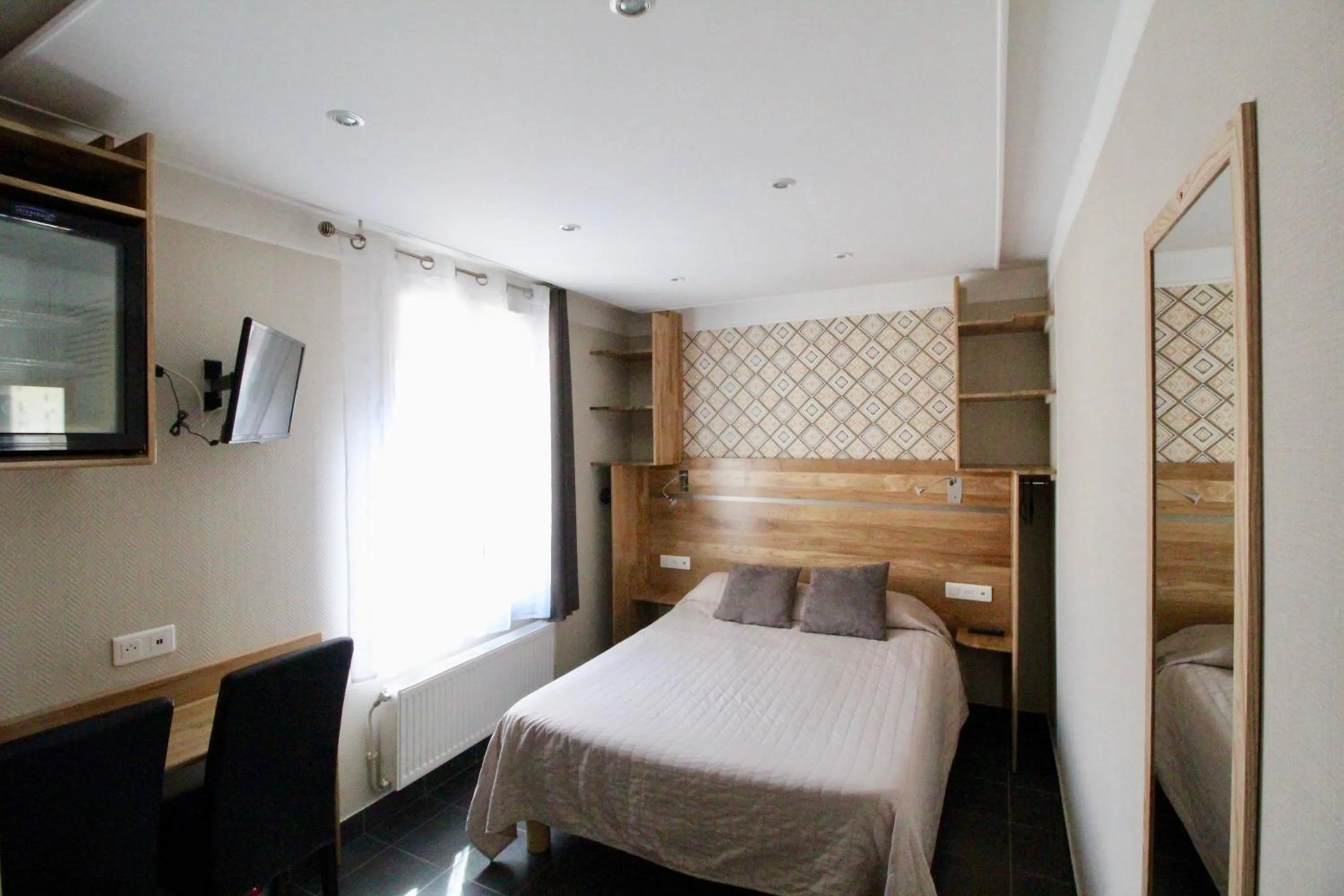 Bed in Hotel des Pyrénées