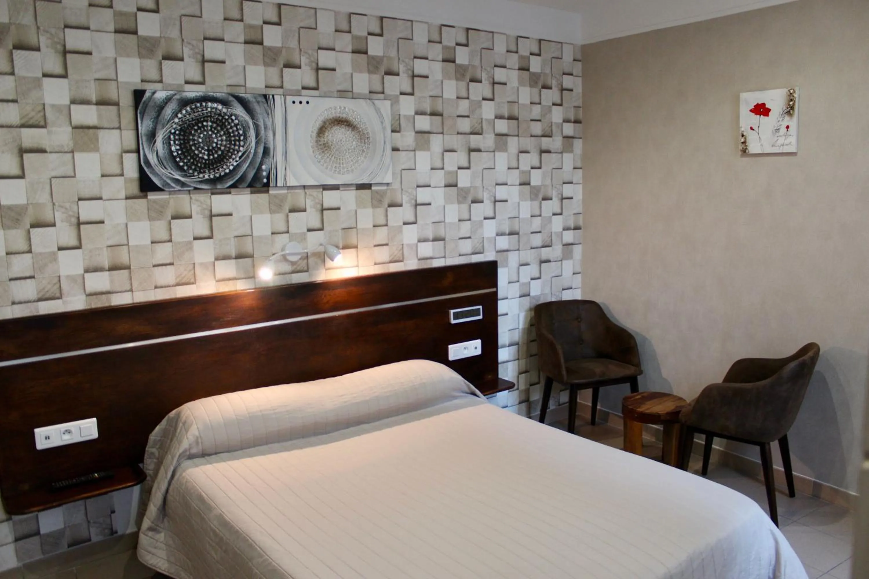 Bed in Hotel des Pyrénées