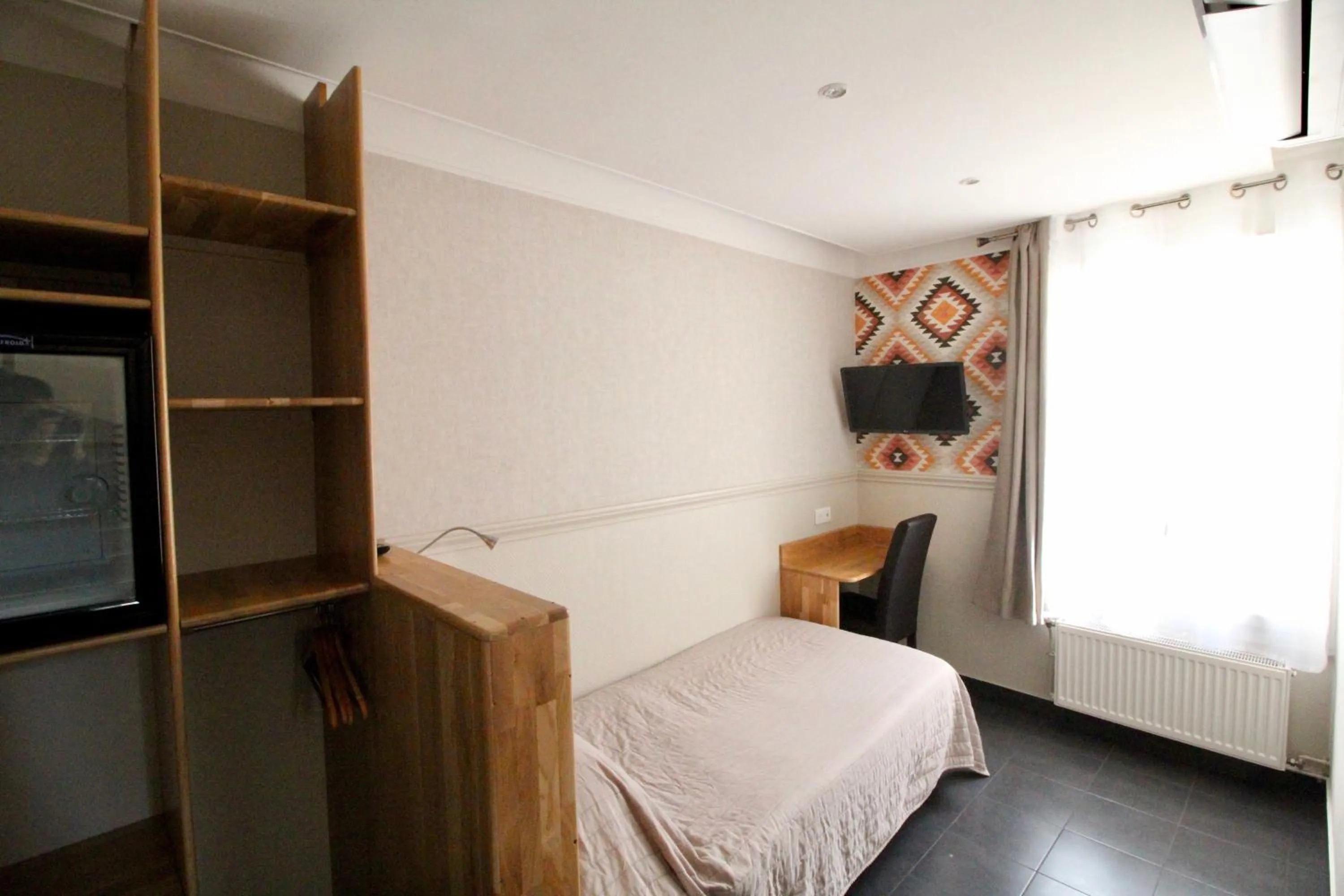 Bed in Hotel des Pyrénées