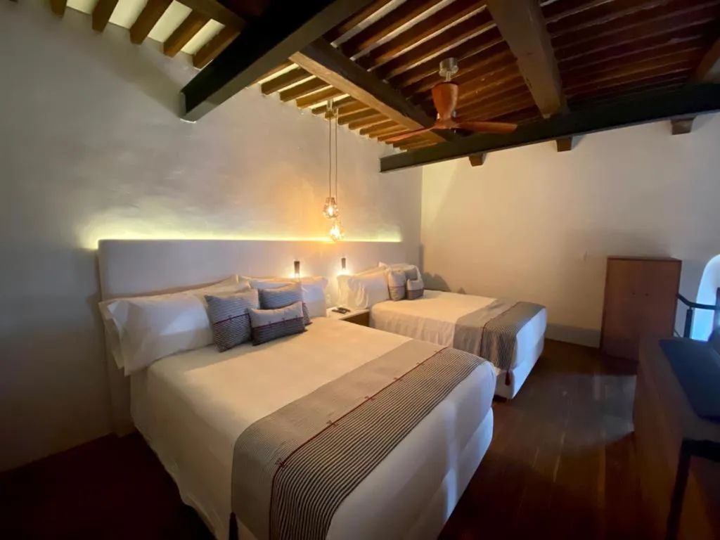 Bed in Las Lupitas Hotel Boutique