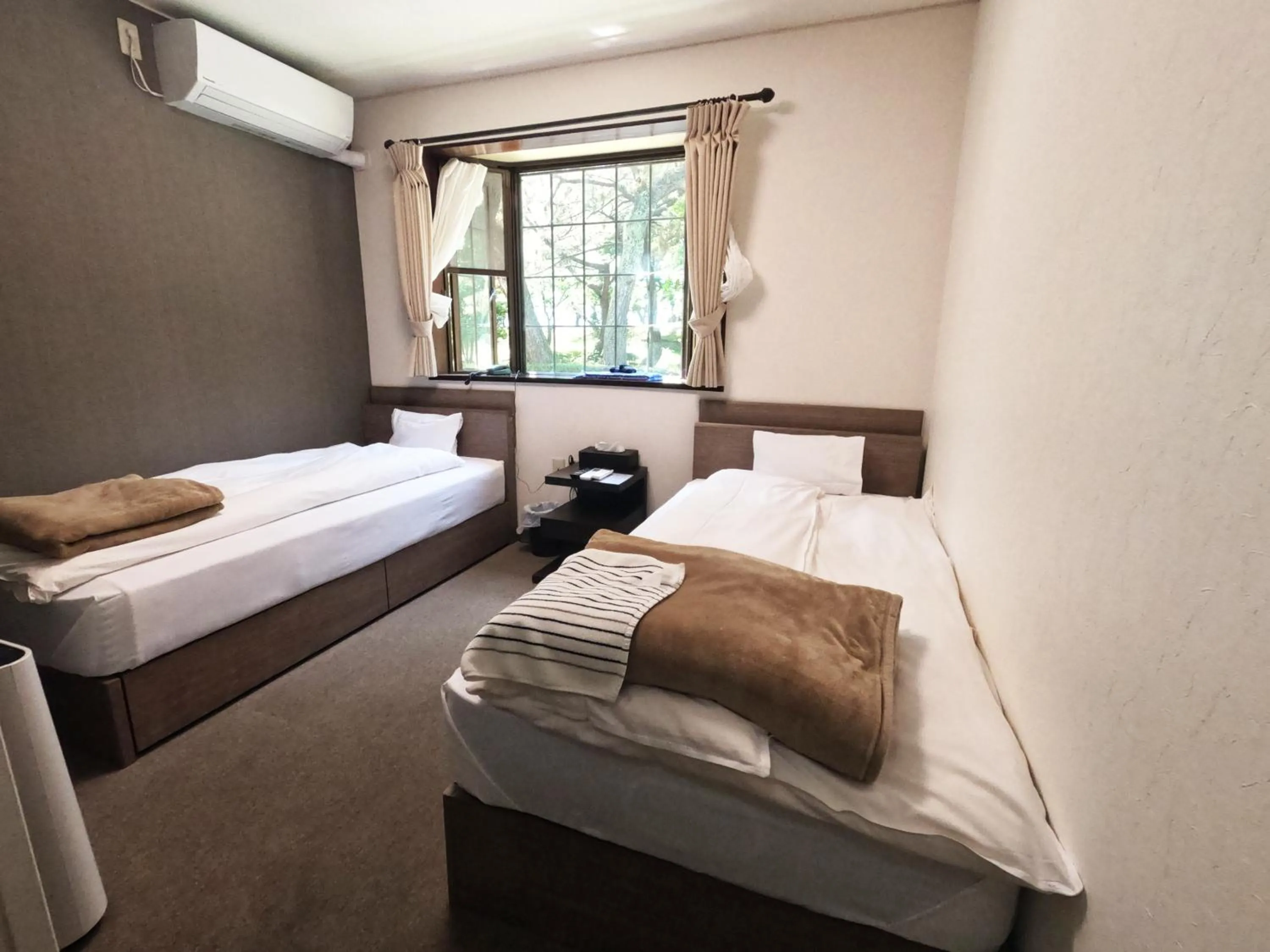 Photo of the whole room, Bed in SUIHOUEN