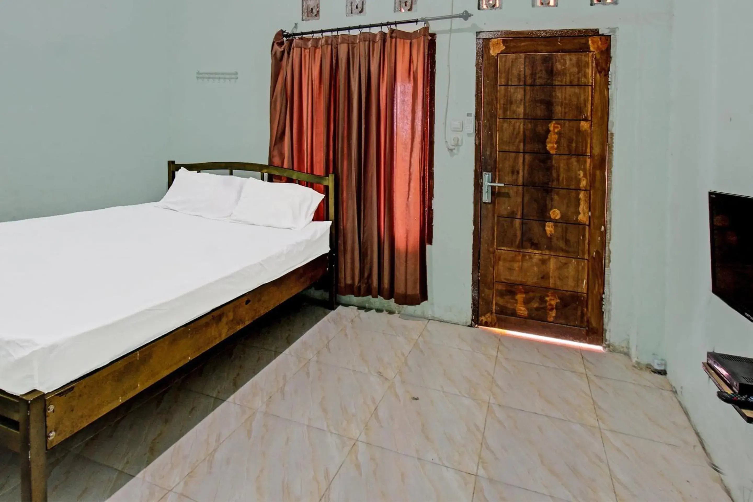 Bedroom, Bed in Hotel O Homestay Bang HajiNearLapangan Penujak ( Inen Gonggang) Bedroom, Bed in Hotel O Homestay Bang HajiNearLapangan Penujak ( Inen Gonggang)