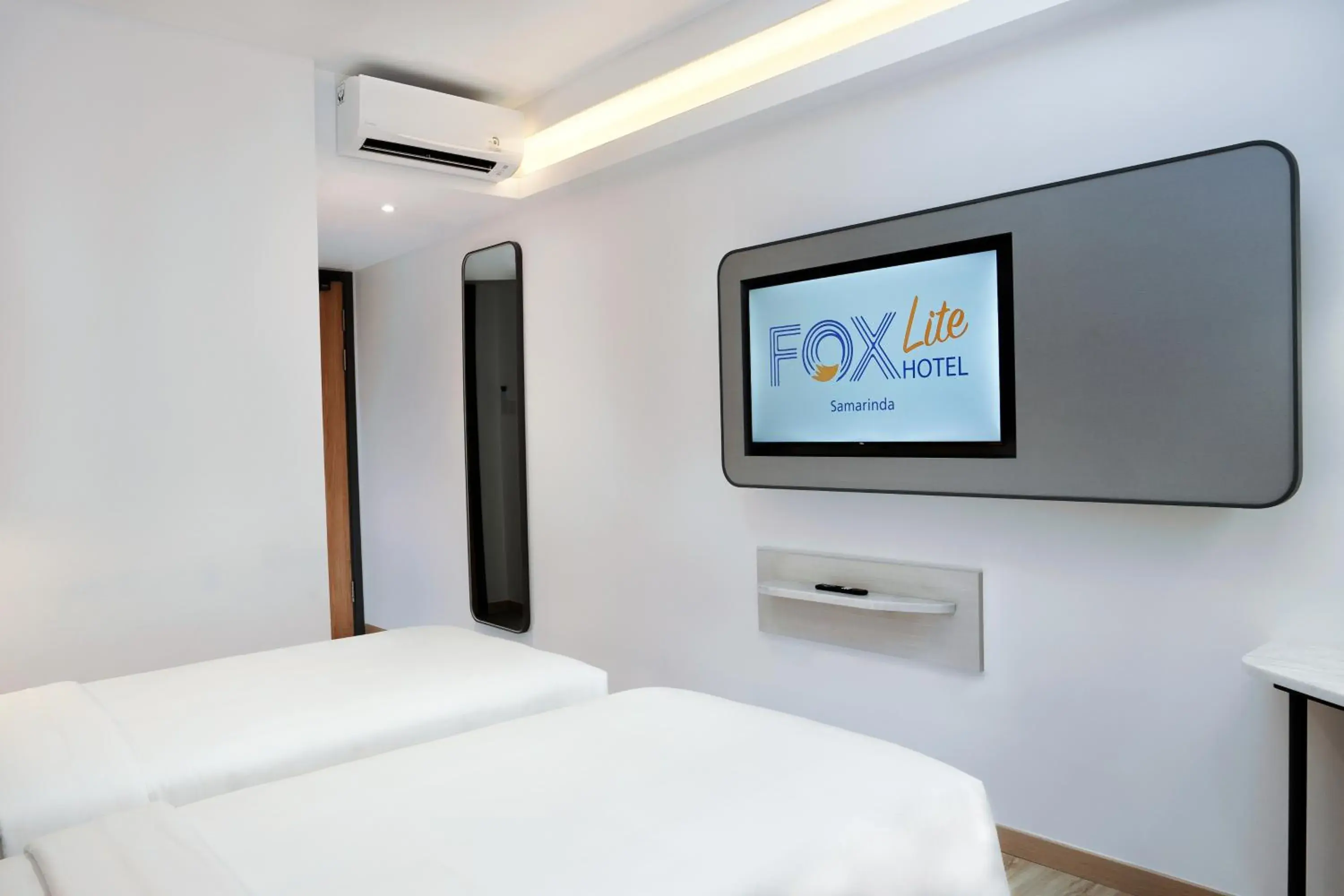 Photo of the whole room, Bed in FOX Lite Hotel Samarinda Photo of the whole room, Bed in FOX Lite Hotel Samarinda