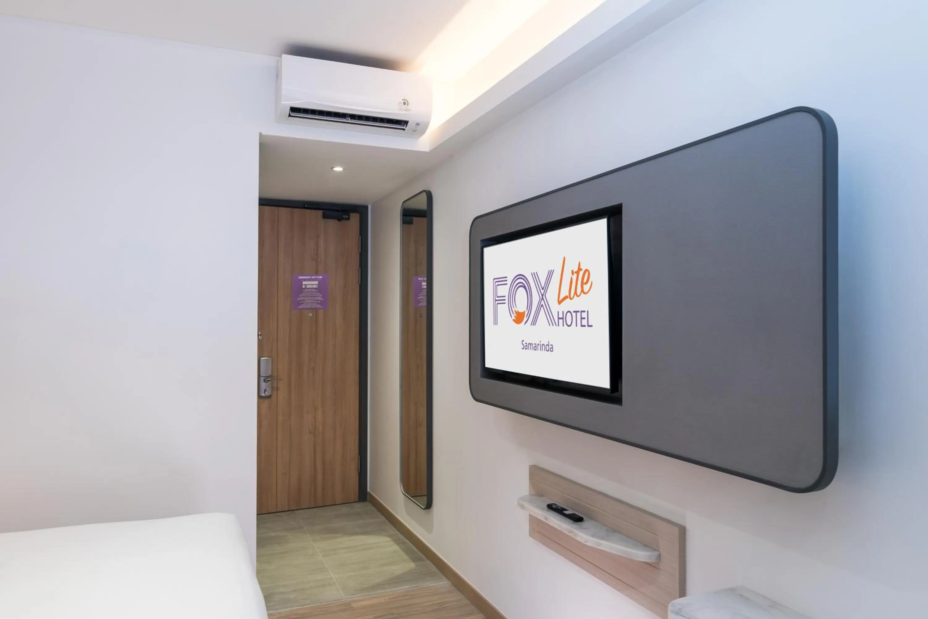 TV and multimedia, Bed in FOX Lite Hotel Samarinda