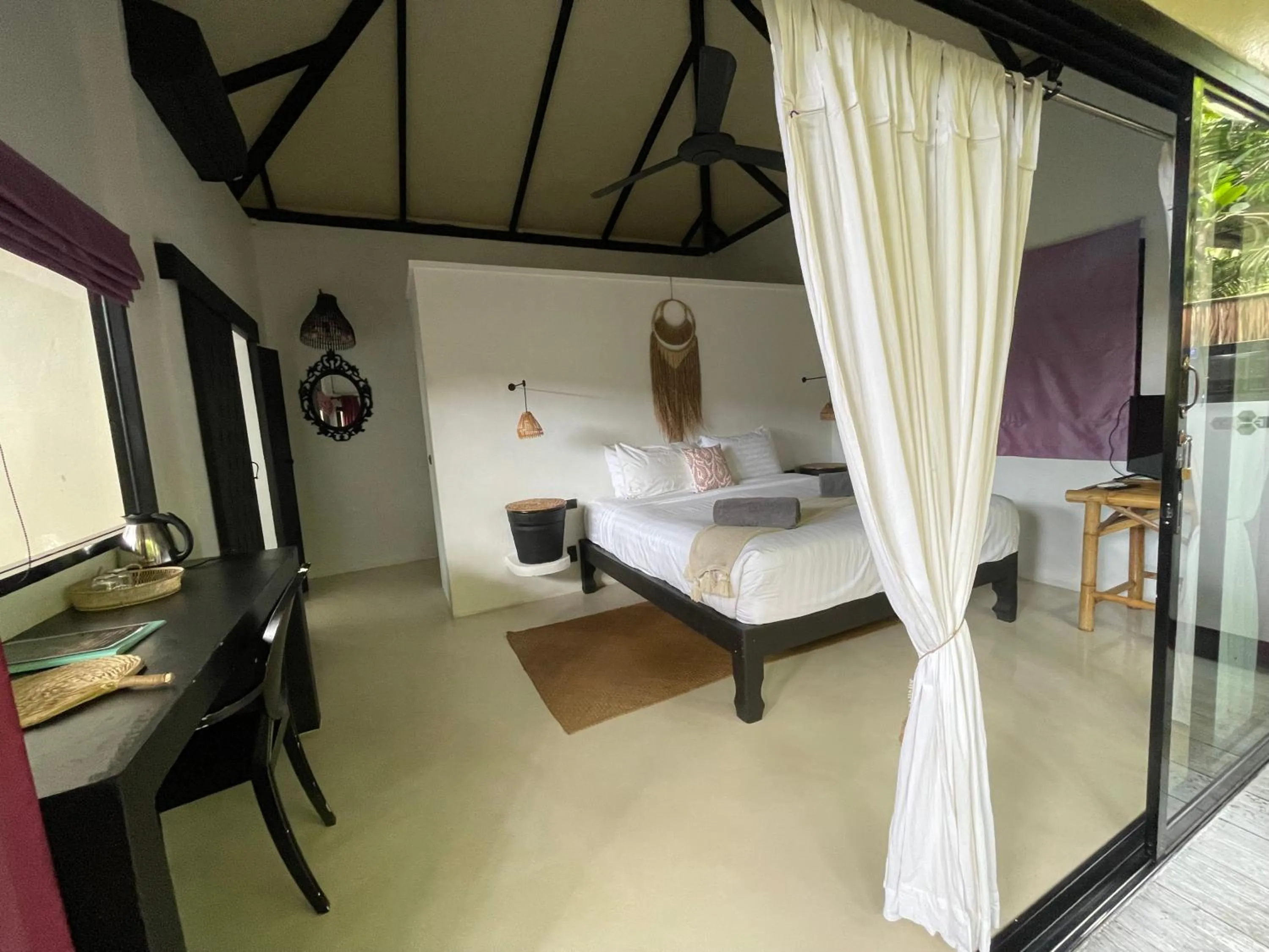 Photo of the whole room, Bed in Jade cottages