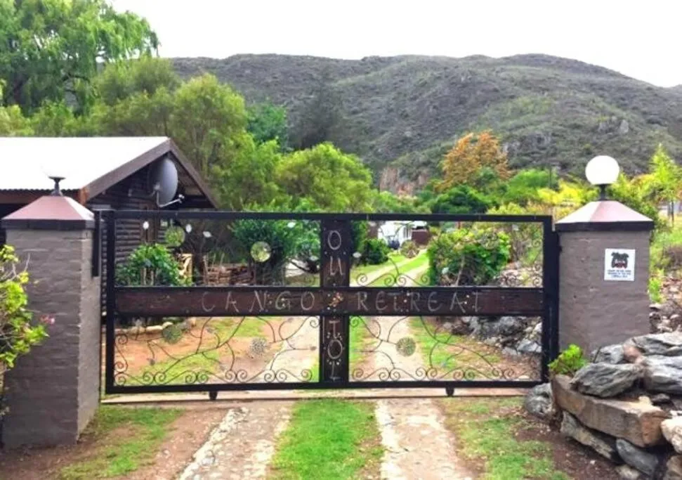 Property logo or sign in Cango Retreat Breathe