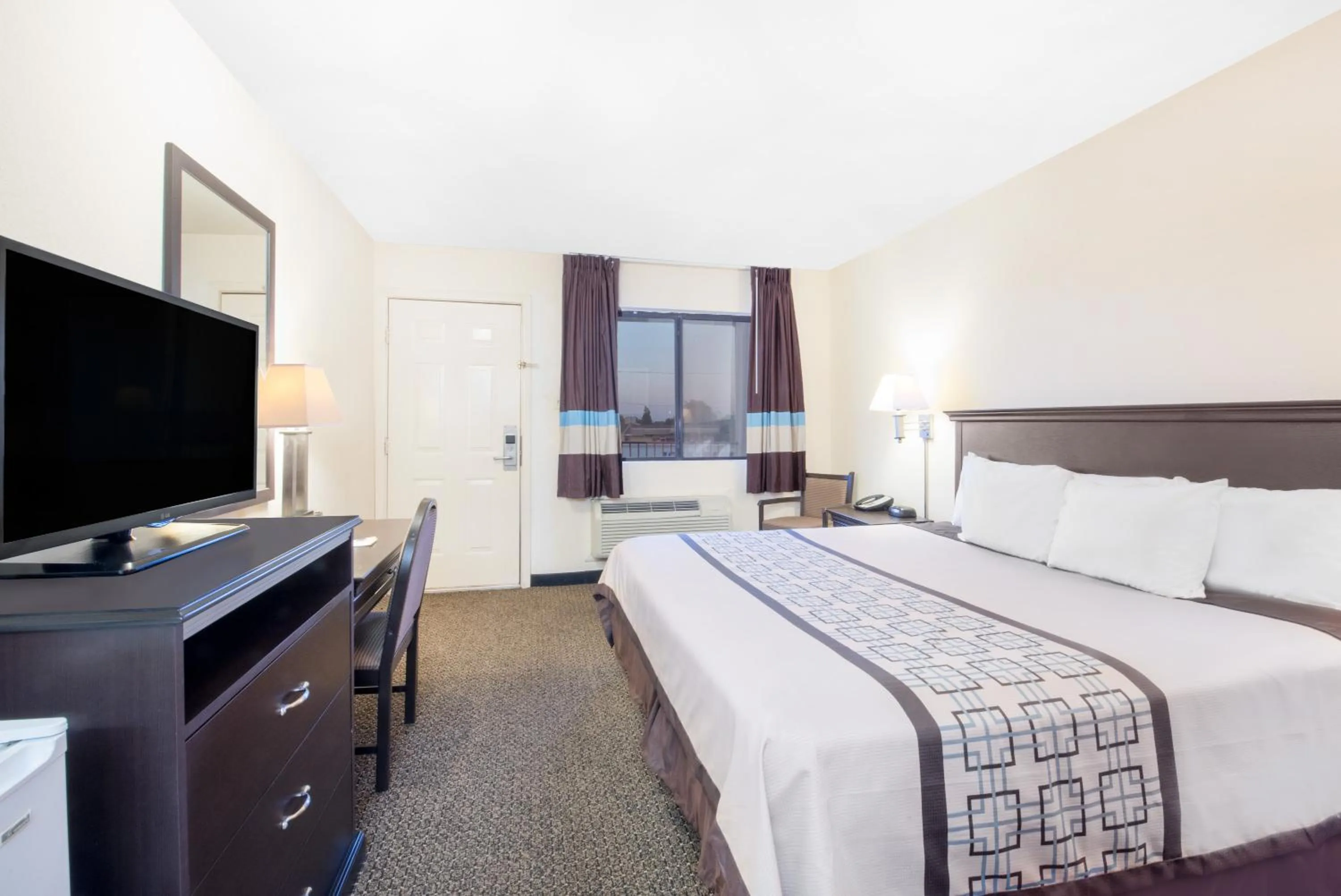 Bedroom, Bed in Americas Best Value Inn Hobbs