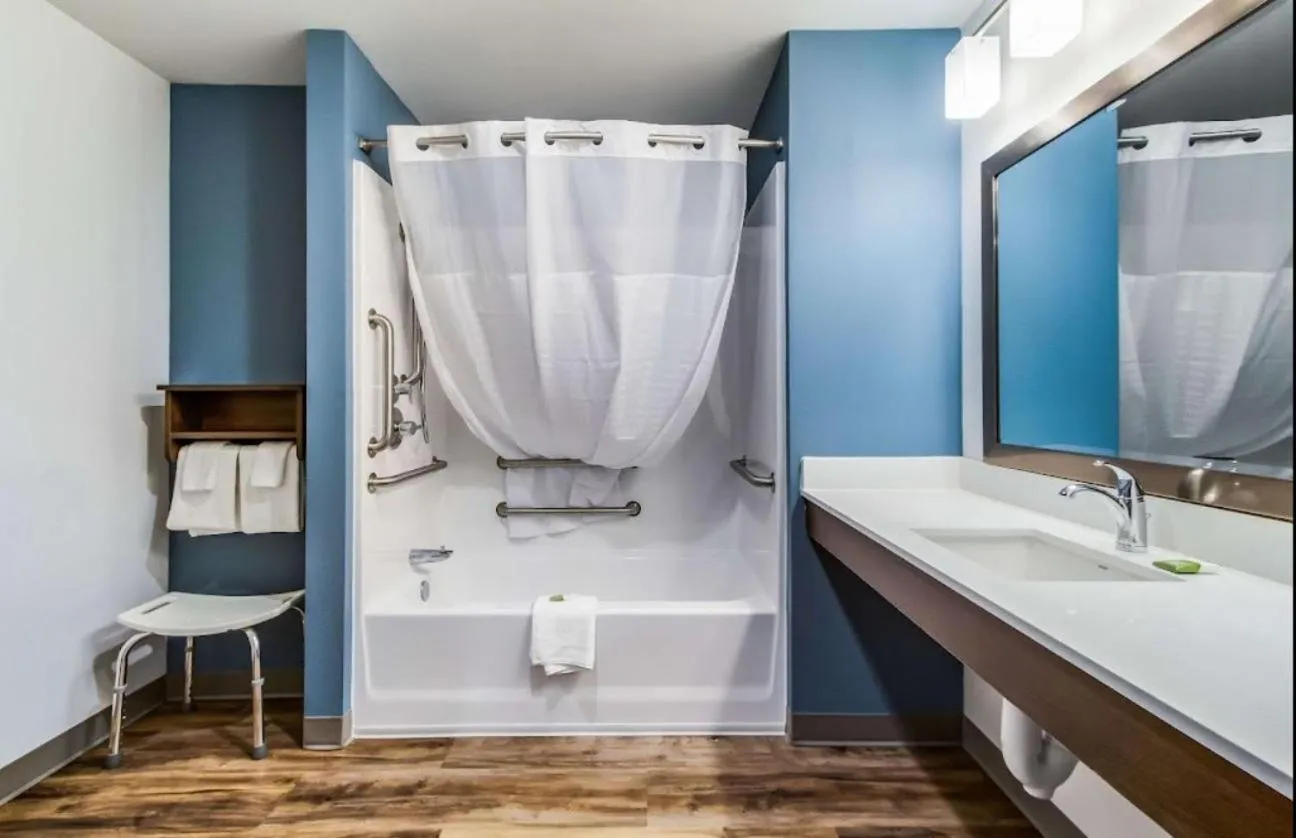Bathroom in WoodSpring Suites Harrisburg Linglestown